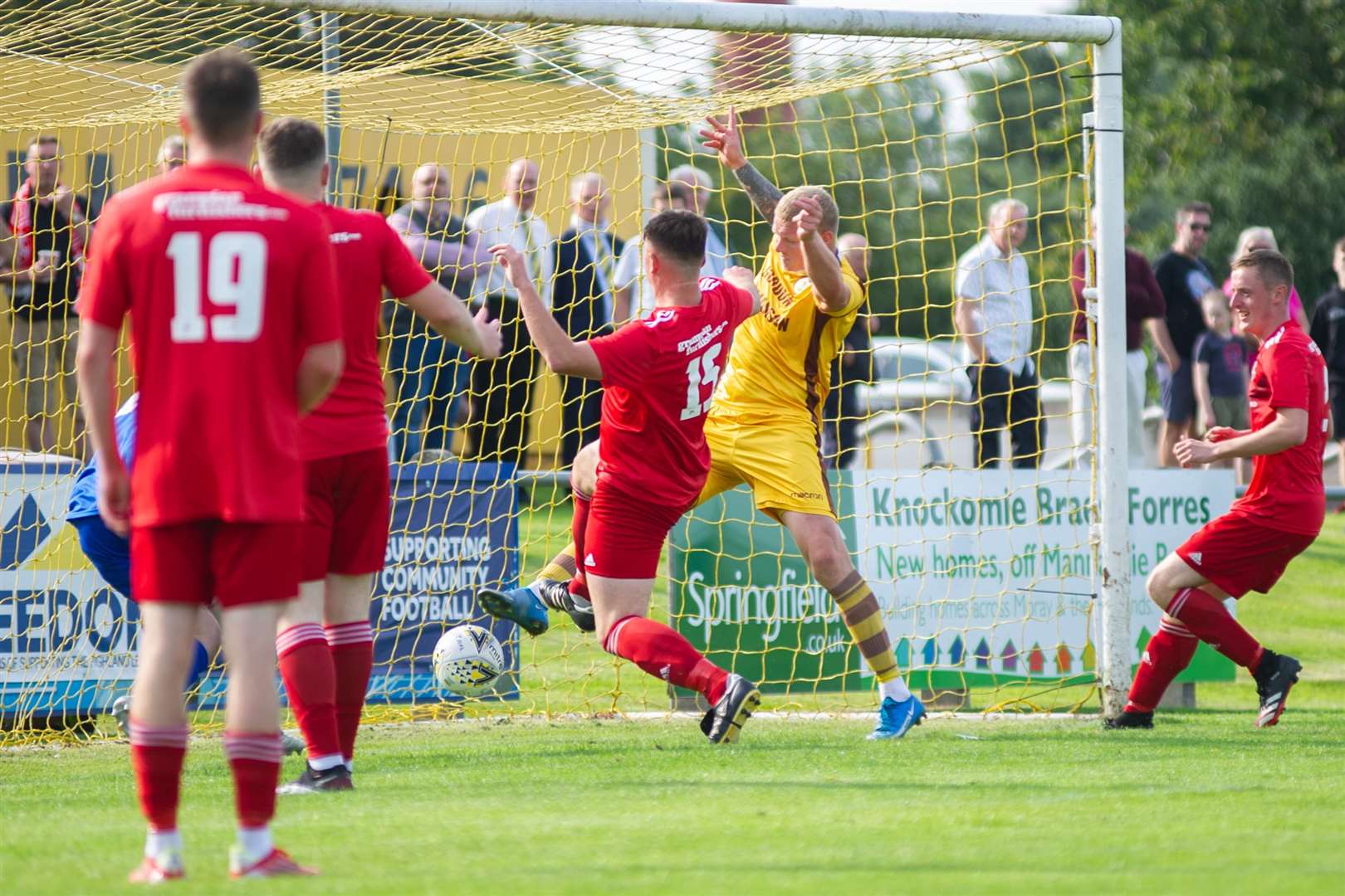 Forres frontman Lee Fraser pokes the ball home from close range scoring the only goal of the afternoon. ..Forres Mechanics FC (1) vs Lossiemouth FC (0) - Highland Football League - Mosset Park, Forres 28/08/2021...Picture: Daniel Forsyth..