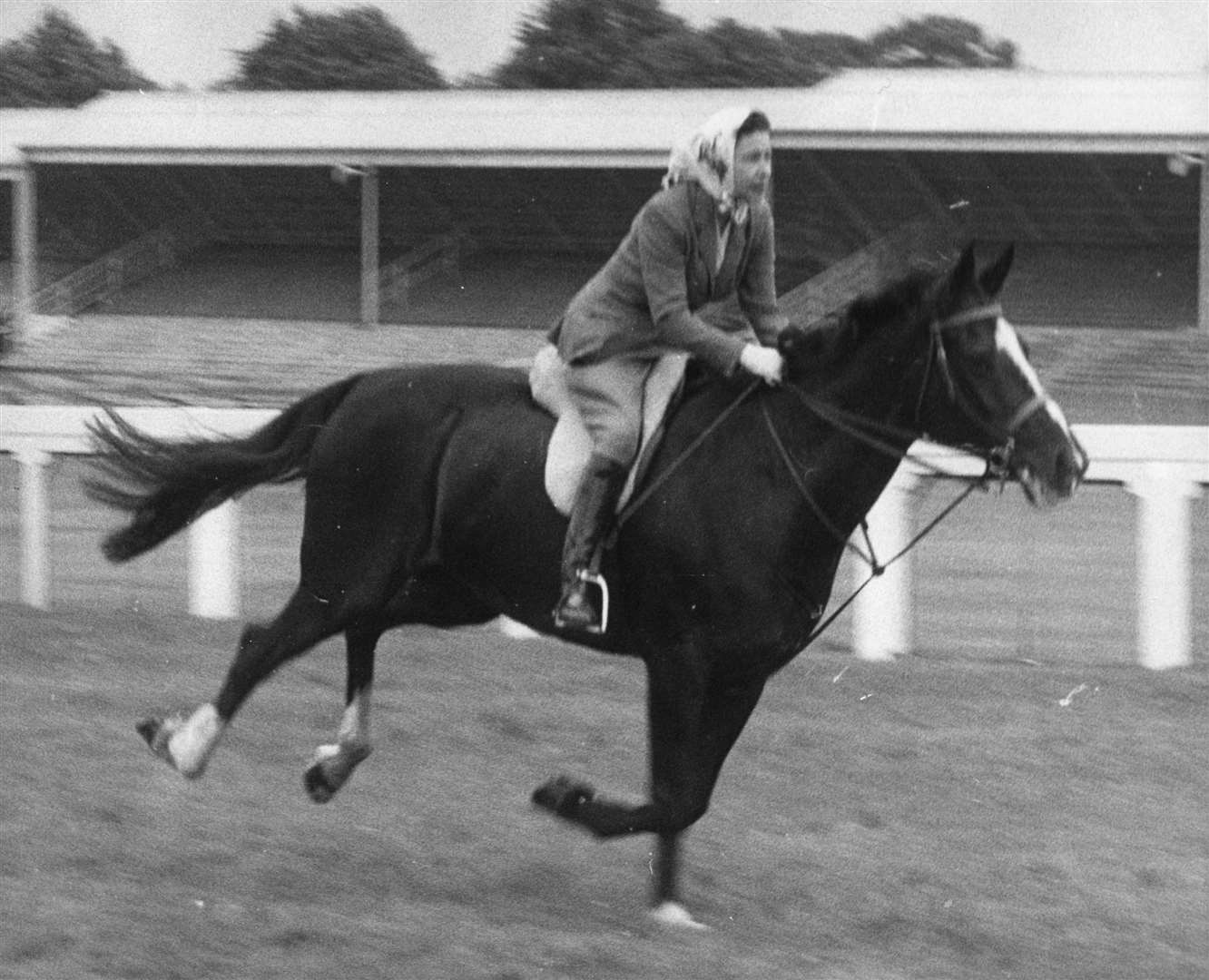 The Queen in 1960 riding on the racecourse before the opening of the third day of the Royal Ascot meeting (PA)