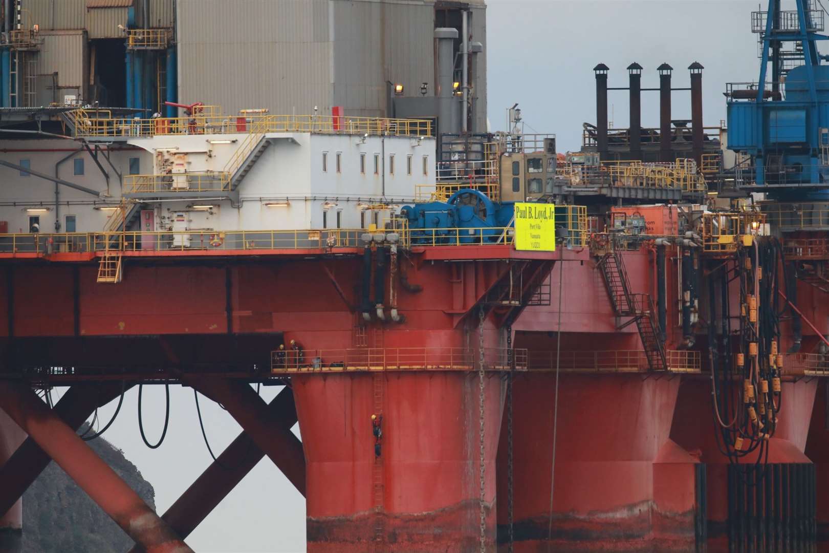 Greenpeace climbers on the BP oil rig in the Cromarty Firth.