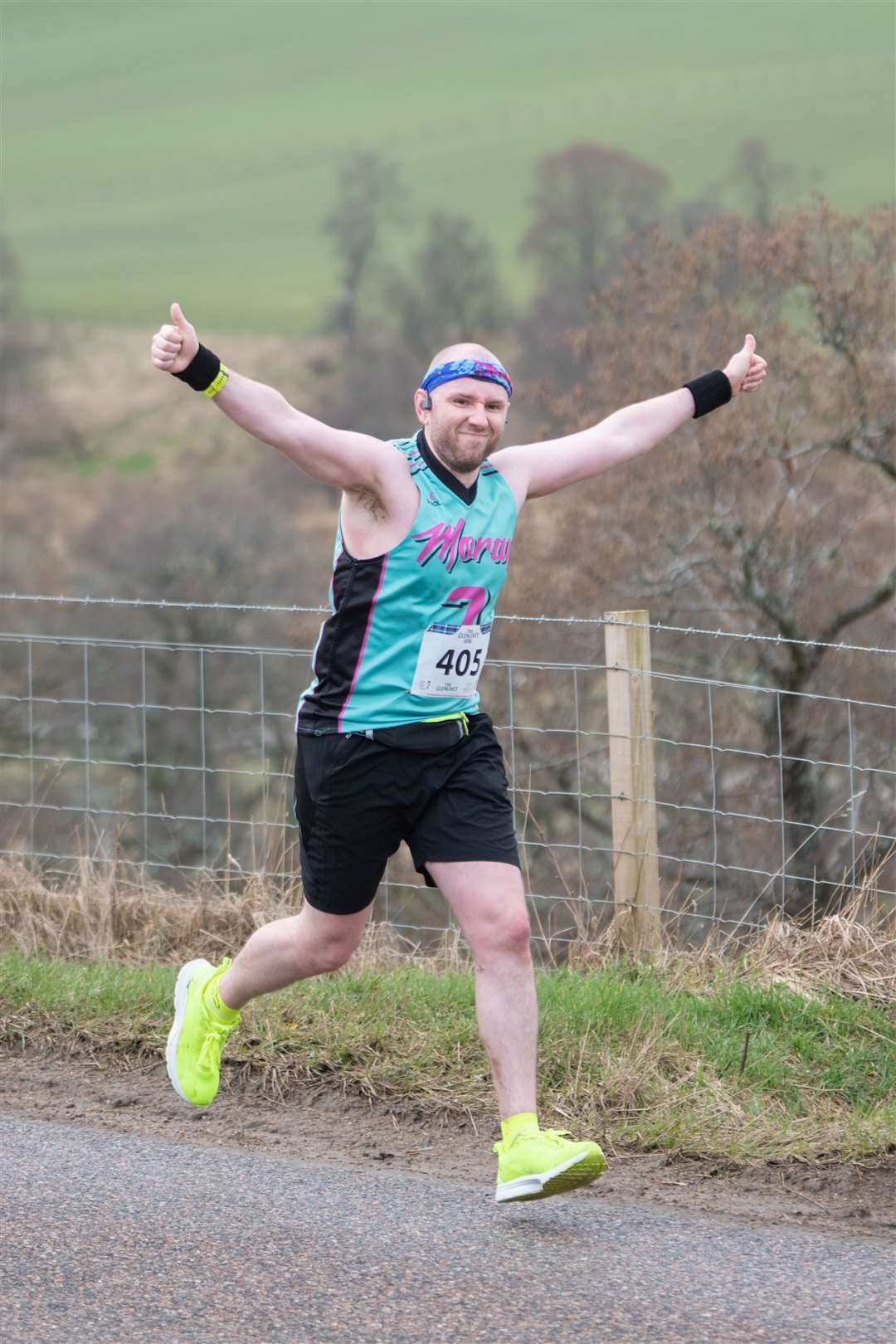 A cheer from #405 Matthew Wilson as he approaches the finishline to finish in a time of 46:35...2023 Glenlivet 10k Race, which raises money for Chest Heart & Stroke Scotland. .. Picture: Daniel Forsyth..