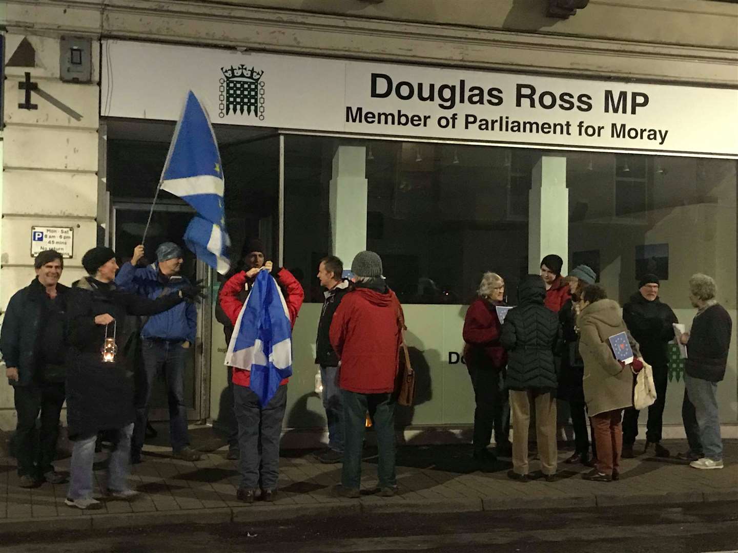 Part of the gathering outside Douglas Ross MP's office on Friday evening.