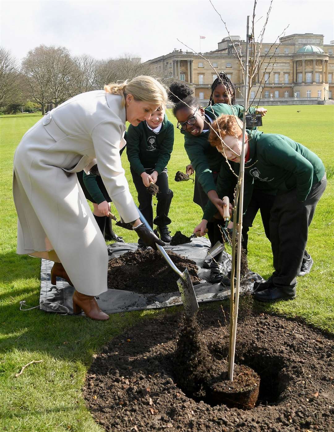 The Countess of Wessex joins year four pupils from Grange Park Primary School in Shropshire, to plant a Jubilee tree (Toby Melville/PA)