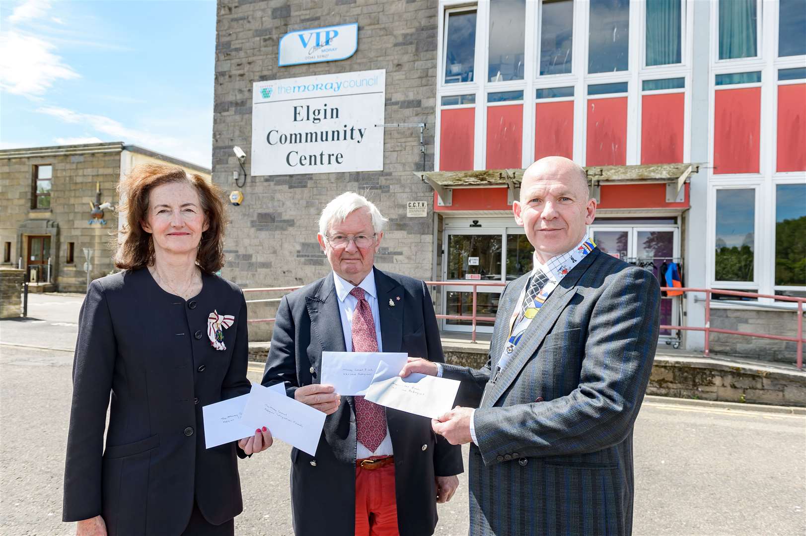 Left to right: Nancy Robson, depute lord lieutenant, Grenville Johnston, chairman of Moray Emergency Relief Fund and Roy Geddes, project manager of Moray Council's refugee resettlement team. Picture: Angus Mclennan, AM Photos