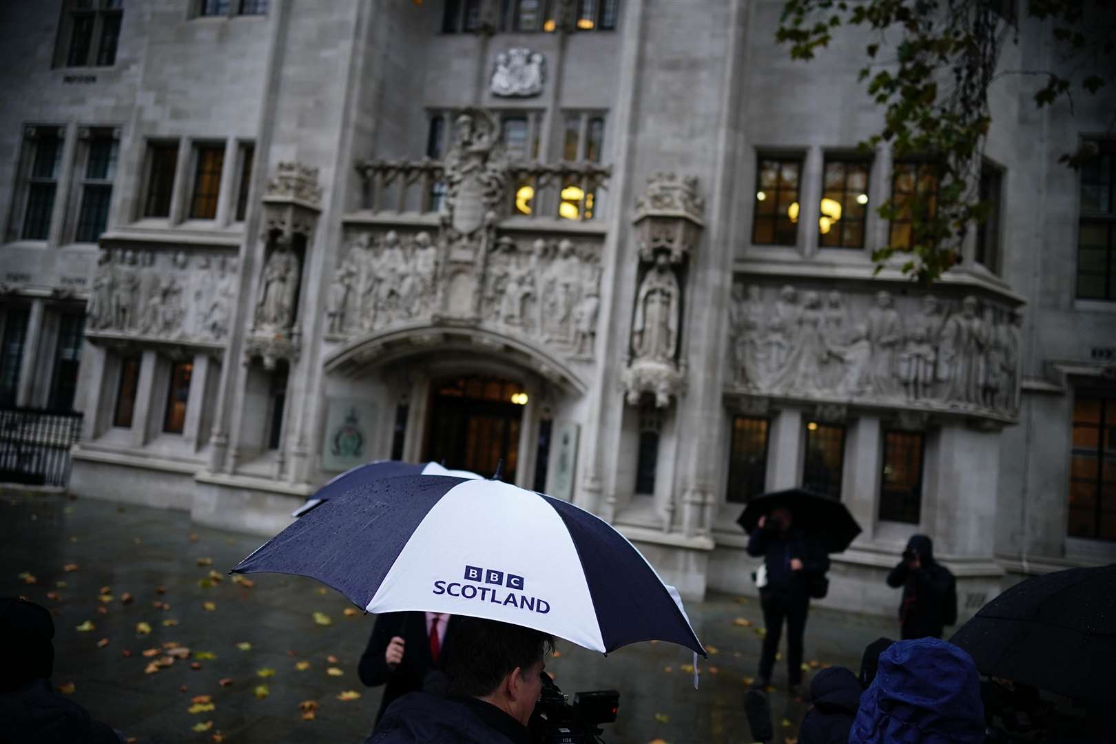 Media outside the UK Supreme Court in London (Aaron Chown/PA)