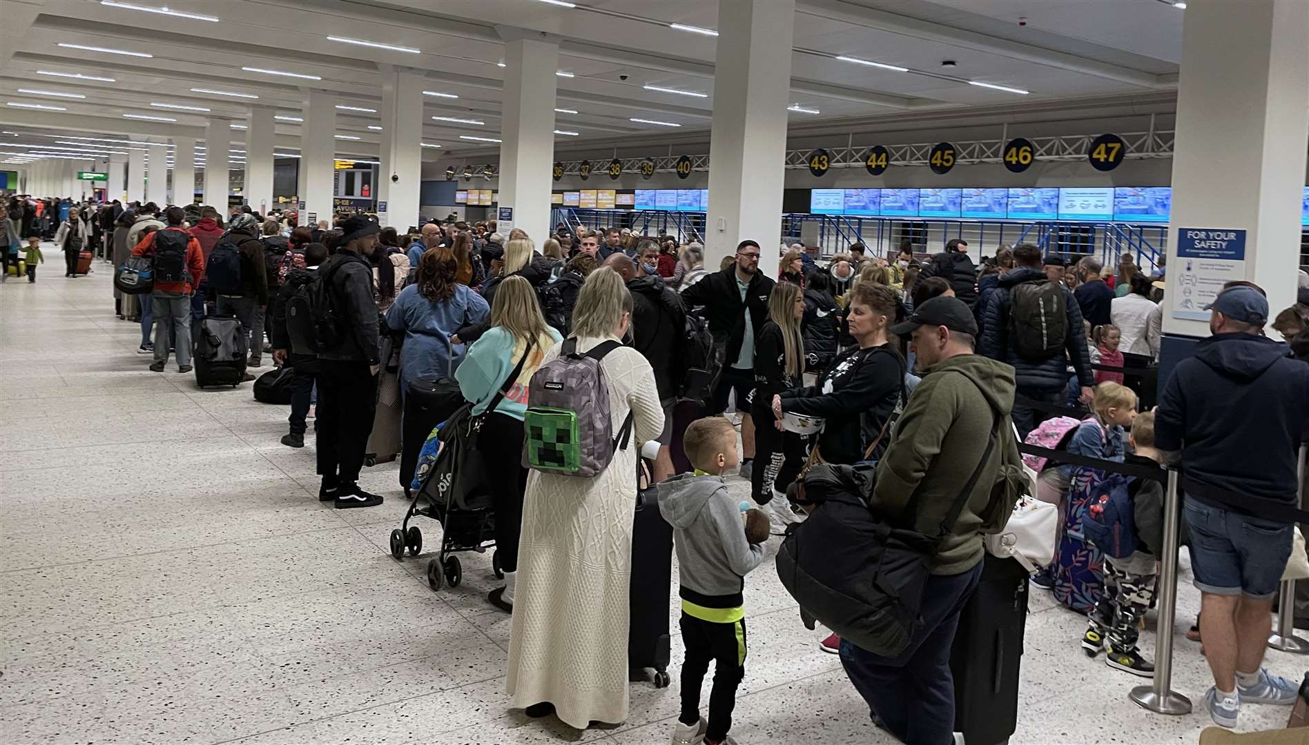 Airports have seen long queues in recent months (Peter Byrne/PA)
