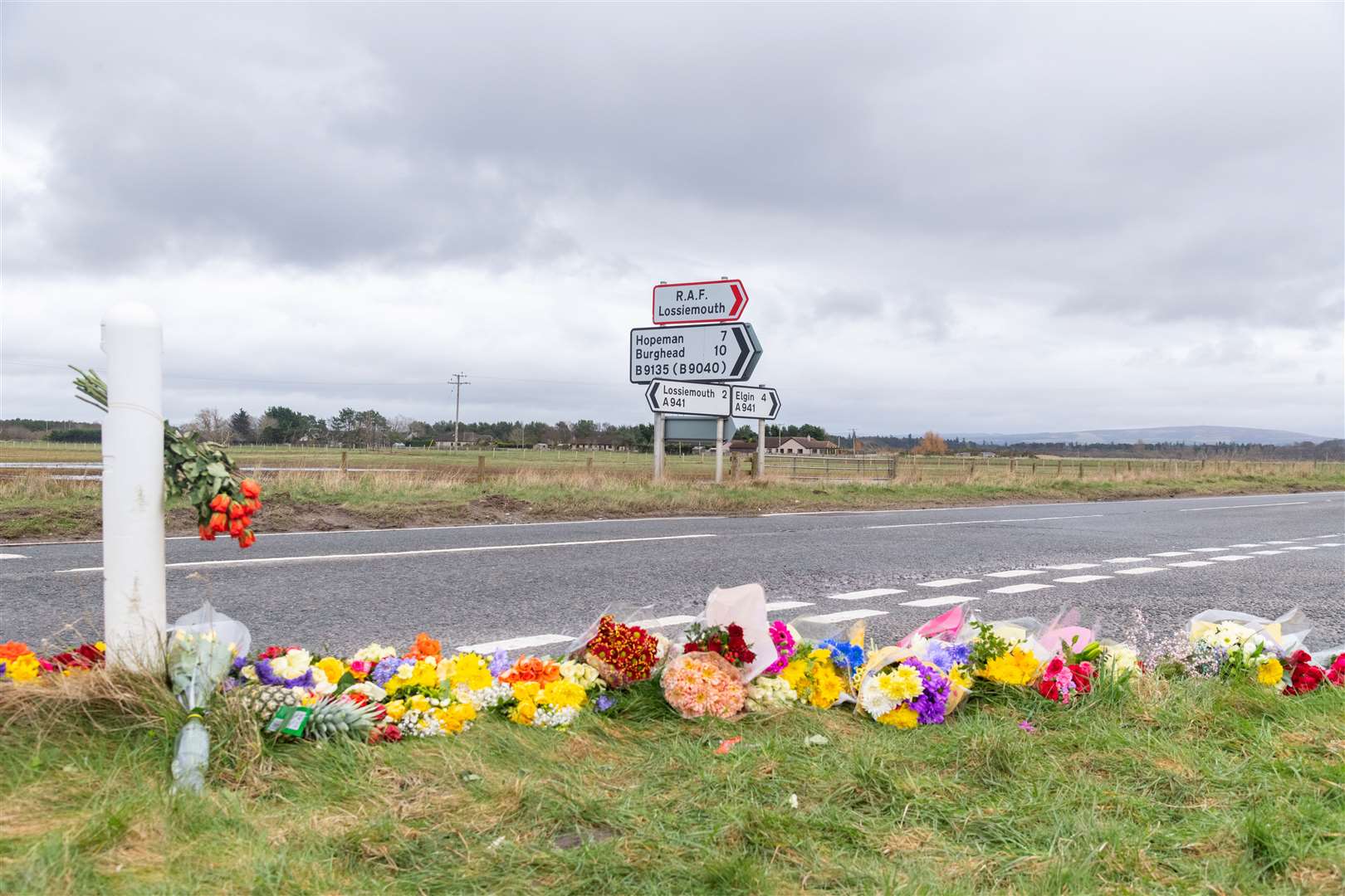 Tributes to Marcus and Gregor have been left at the side of the road. Picture: Beth Taylor