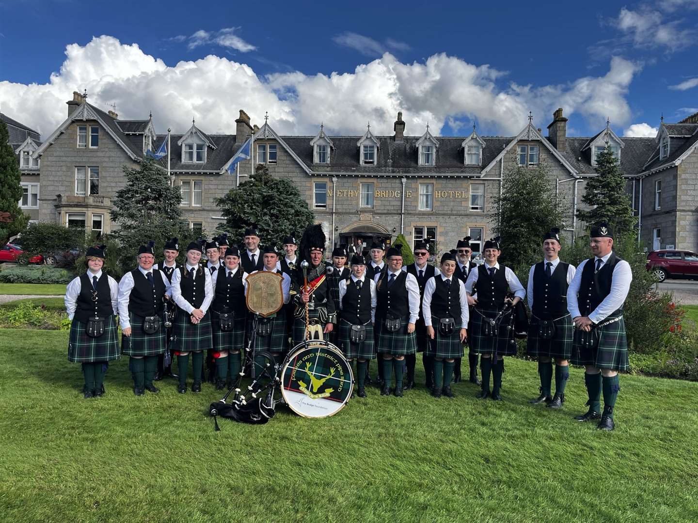 The band with the Challenge Shield at Nethy Bridge Highland Games.
