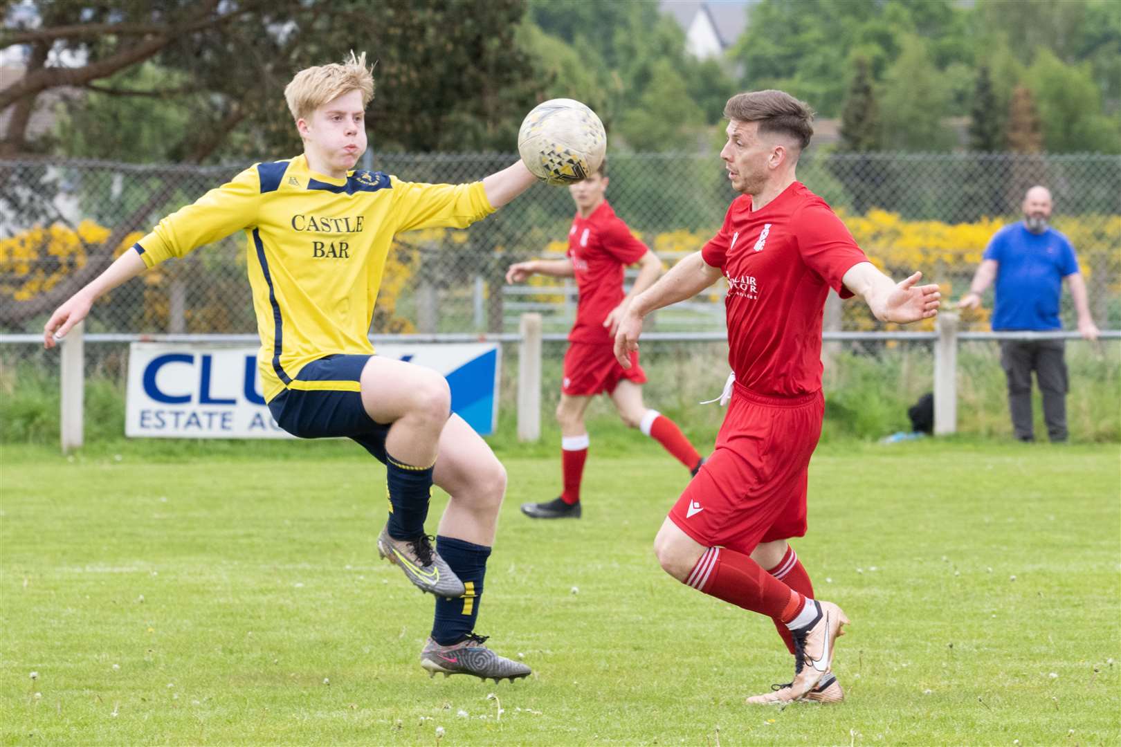 Forres Thistle's Neil Moir and Glentanar's Finlay Murray keep their eyes on the ball. . .Forres Thistle v Glentanar Junior Football at Logie Park. ..Picture: Beth Taylor.