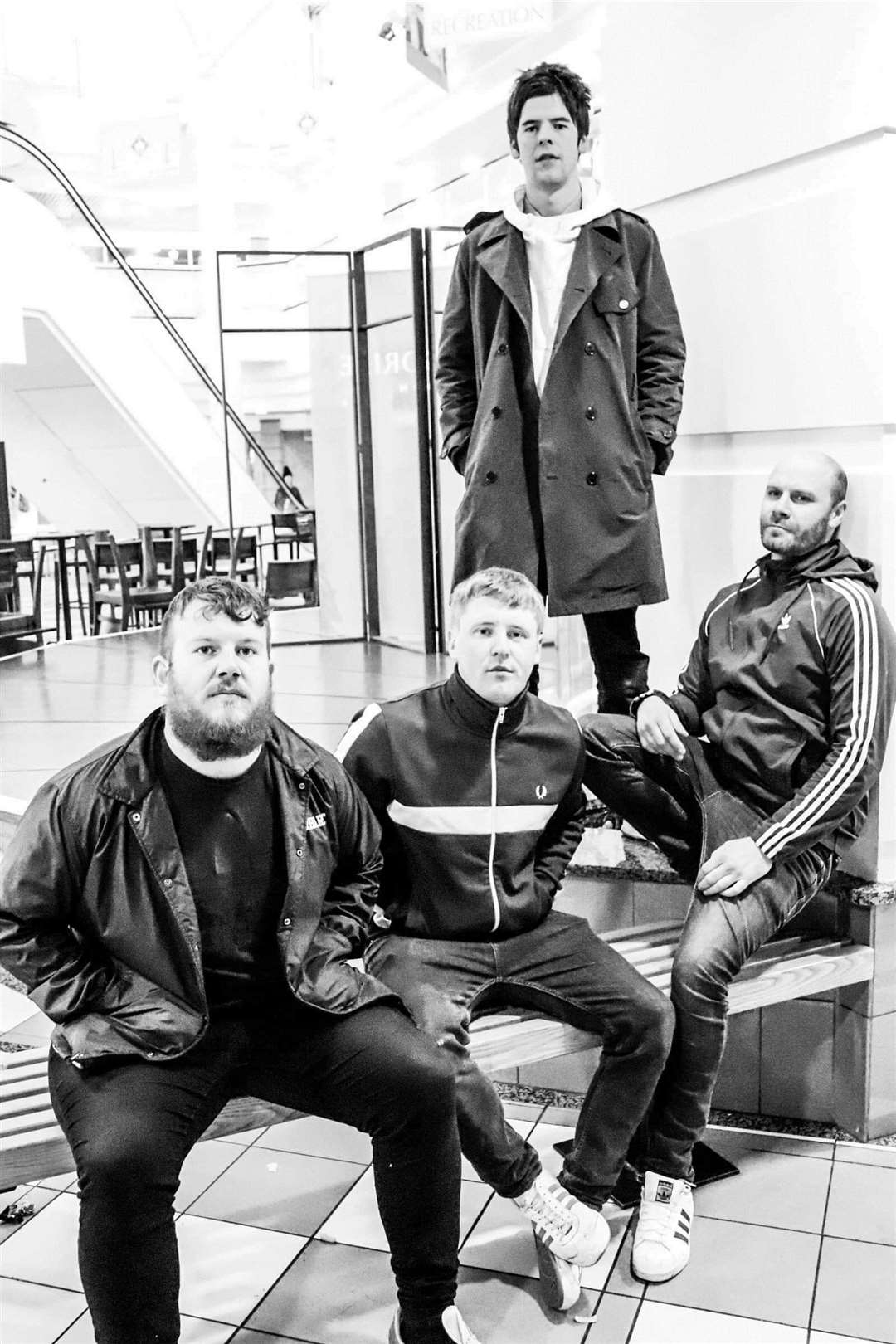 New Mode are: lead singer Ross Campbell (back), Craig Howard (drums), Aaron Christie (lead guitar) and Elwyn Hughes (bass).