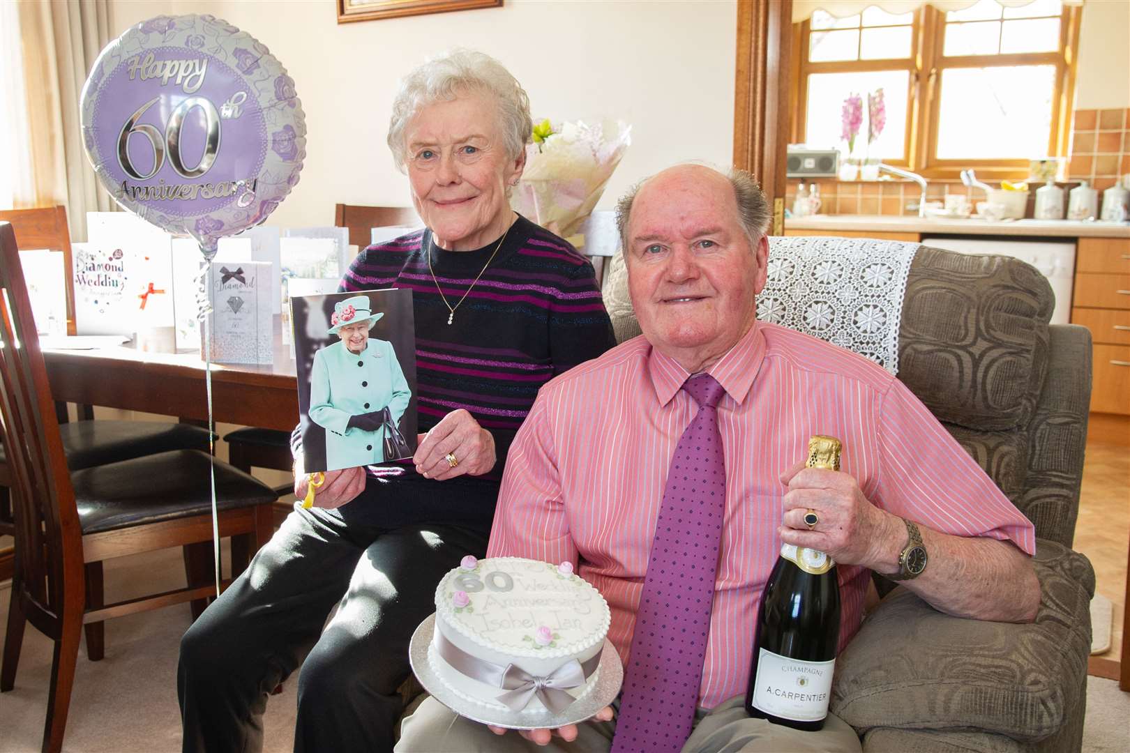 Ian and Isobel Christie, orginally from Brora, celebrate 60 years of married life at the house in Forres. ..Picture: Daniel Forsyth..