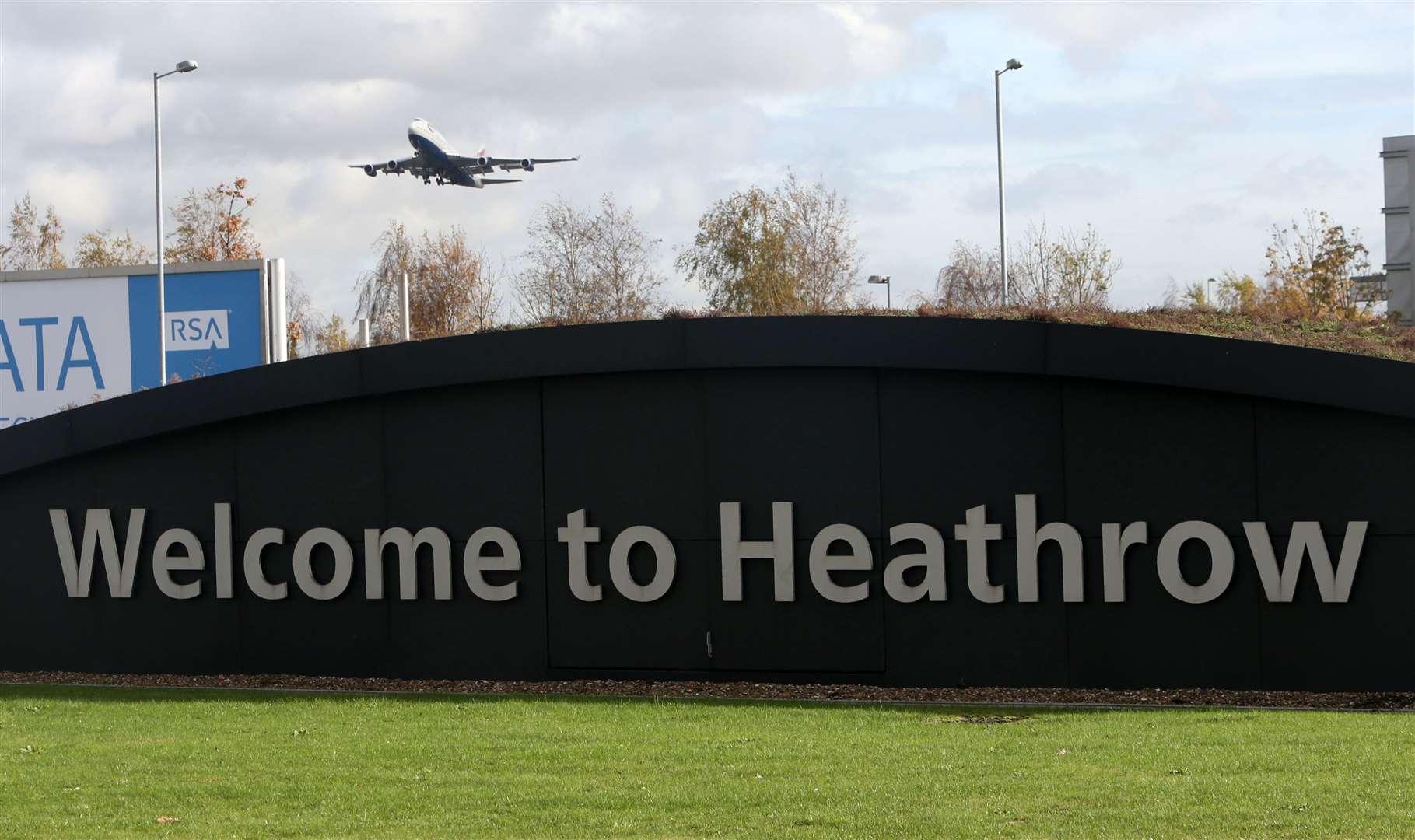 The deputy marshal was arrested after his flight arrived at Heathrow (PA)