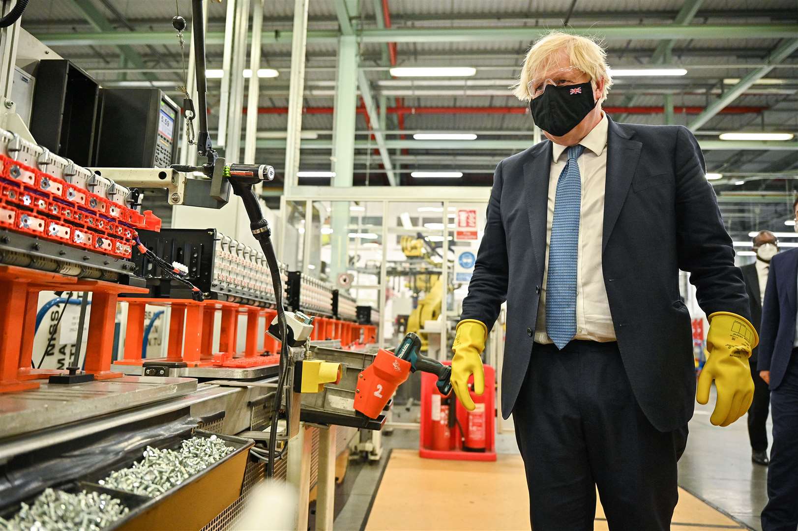 Boris Johnson visits the Envision AESC Holding Ltd battery manufacturing facility inside the Nissan plant in Sunderland (Jeff J Michael/PA)