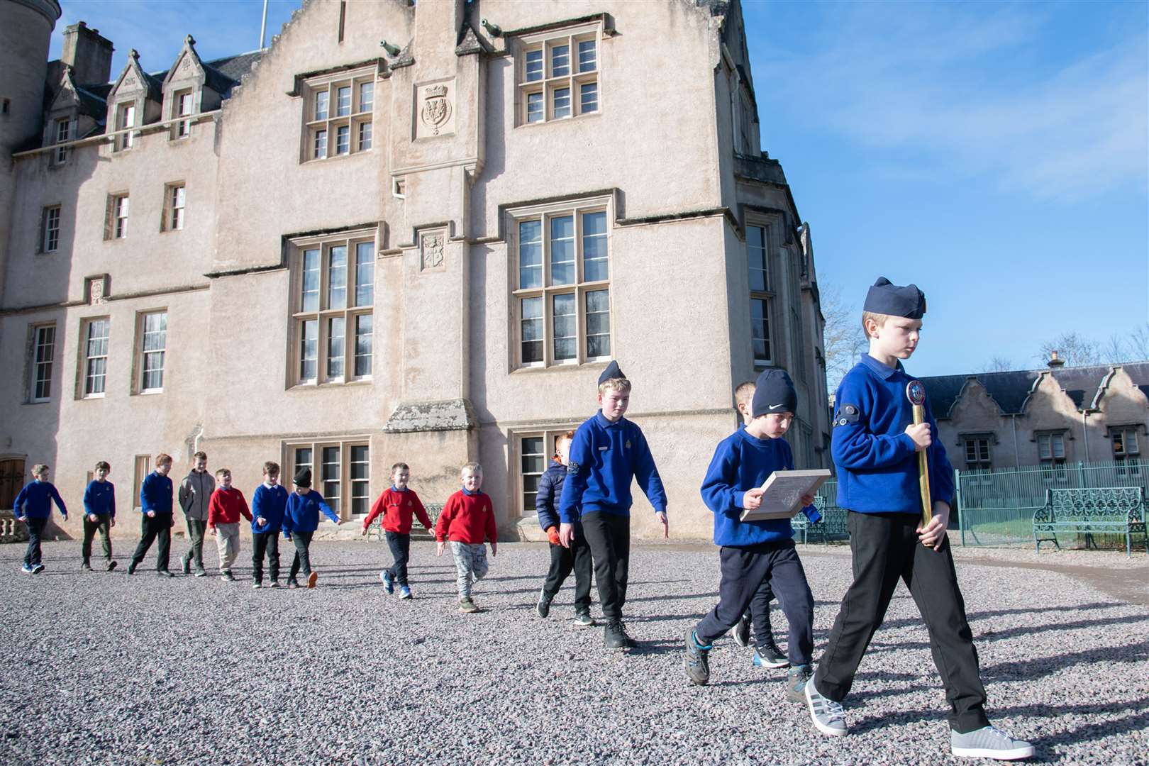 The 2nd Forres Boys' Brigade preparing to hand the baton over to Nairn Boys' Brigade at Brodie Castle.