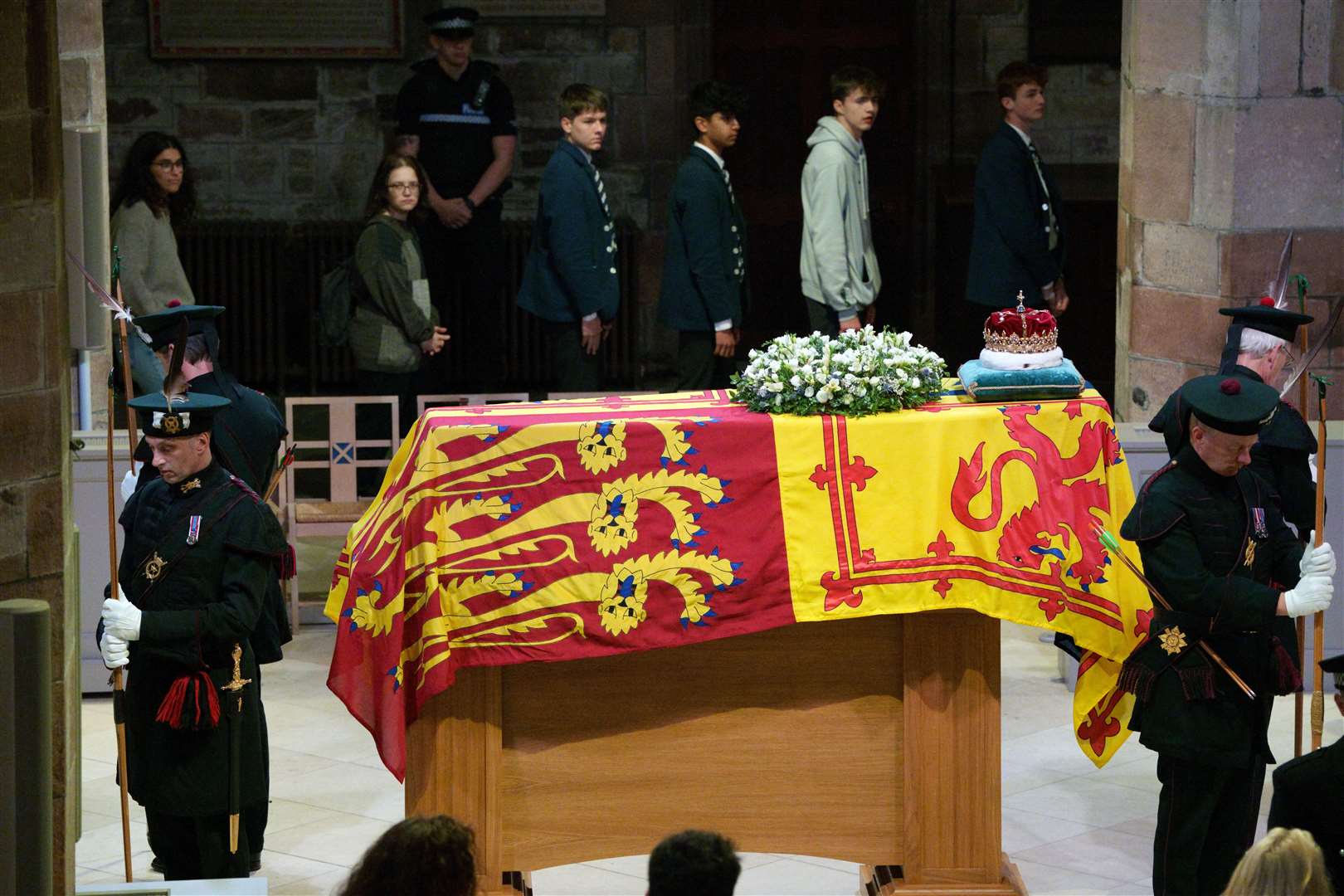 Members of the public file past the coffin of the in St Giles’ Cathedral, Edinburgh, as it lies at rest (Peter Byrne/PA)