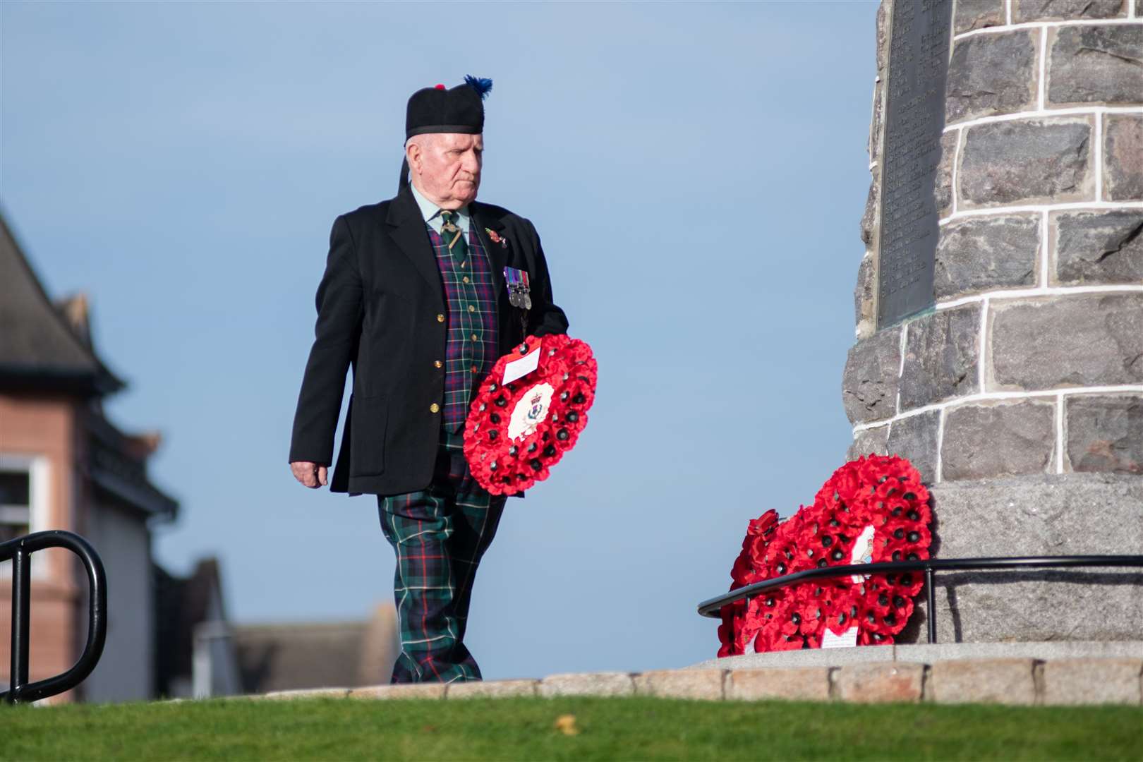 Peter Finlayson laying a wreath in memory of Neal Donald - Queens Own Highlanders. Picture: Daniel Forsyth