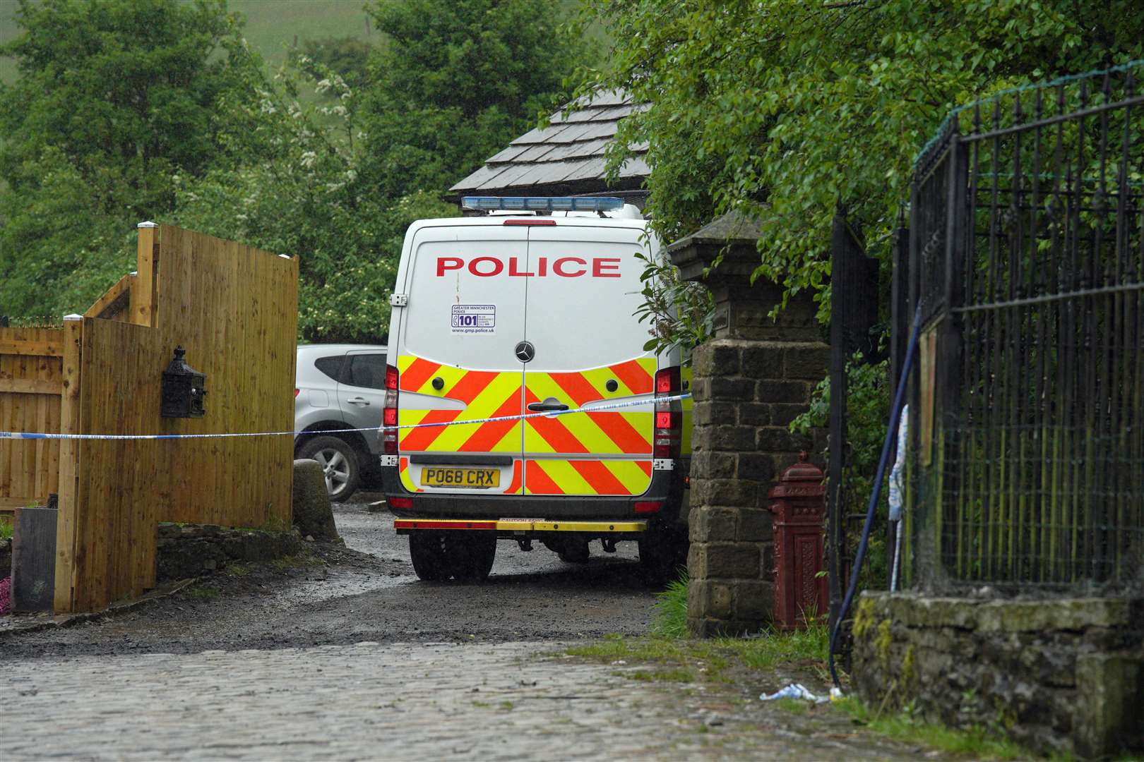 Police in Milnrow, Rochdale (PA)