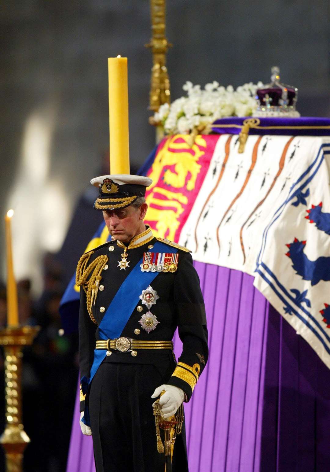 The Prince of Wales stands vigil beside the Queen Mother’s coffin while it lies in state at Westminster Hall in London (PA)