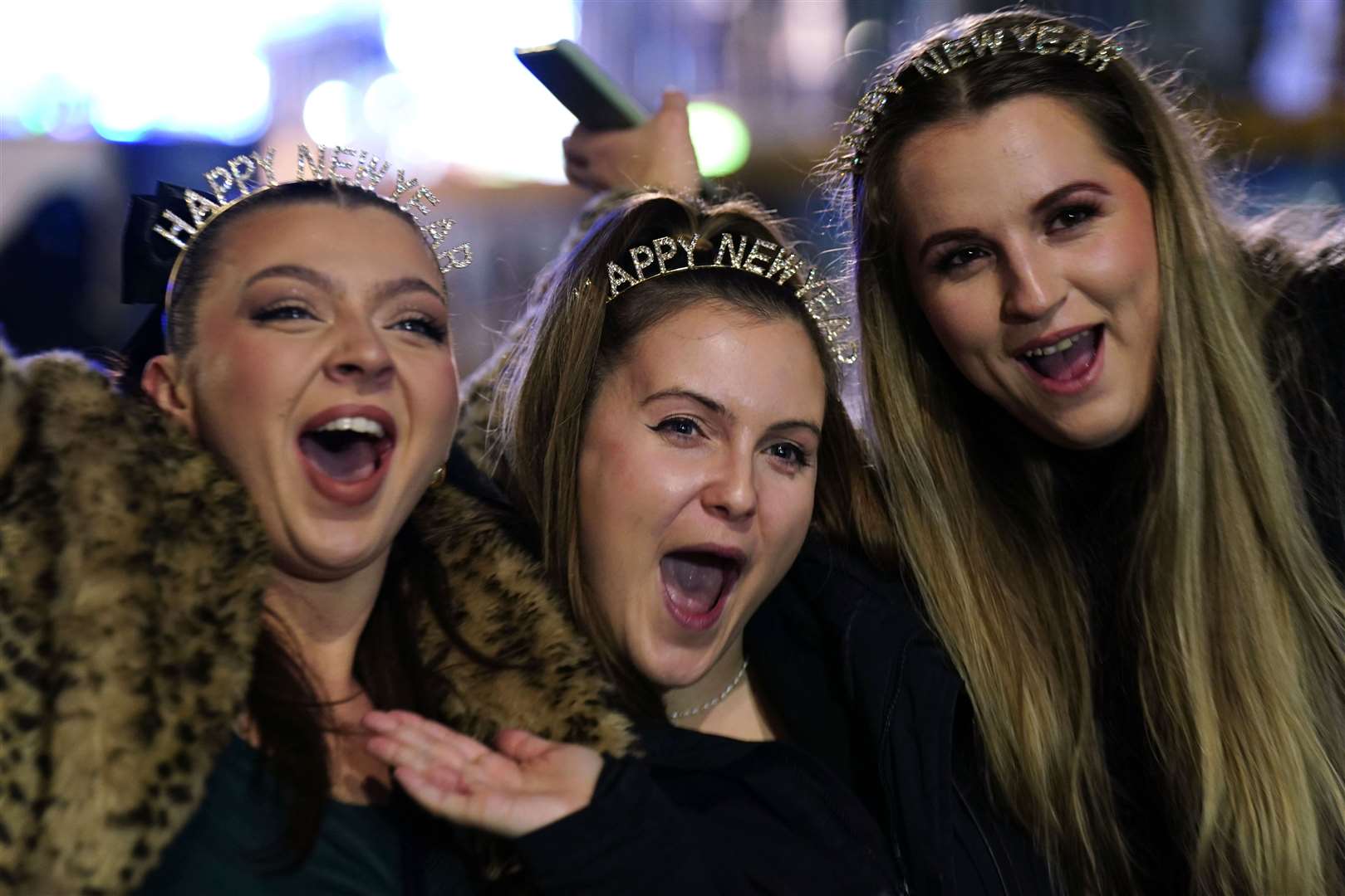 Revellers from Manchester and Liverpool at the Hogmanay New Year celebrations in Edinburgh (Jane Barlow/PA)