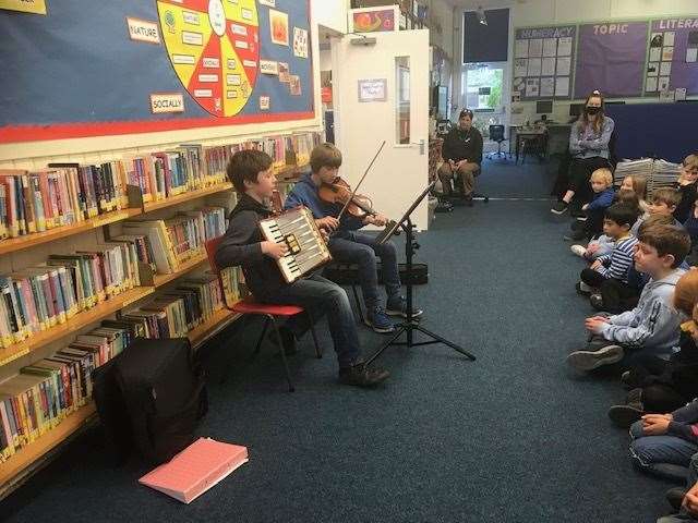 Finlay MacConnachie on accordion and Fionn Ralph on violin.