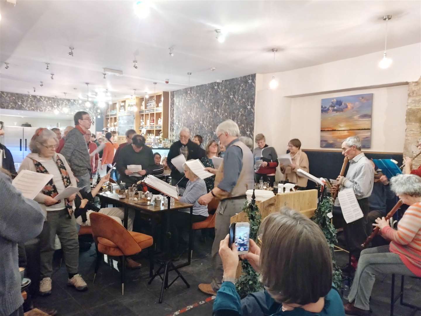 The first carol singing session at Café 1496 last December.