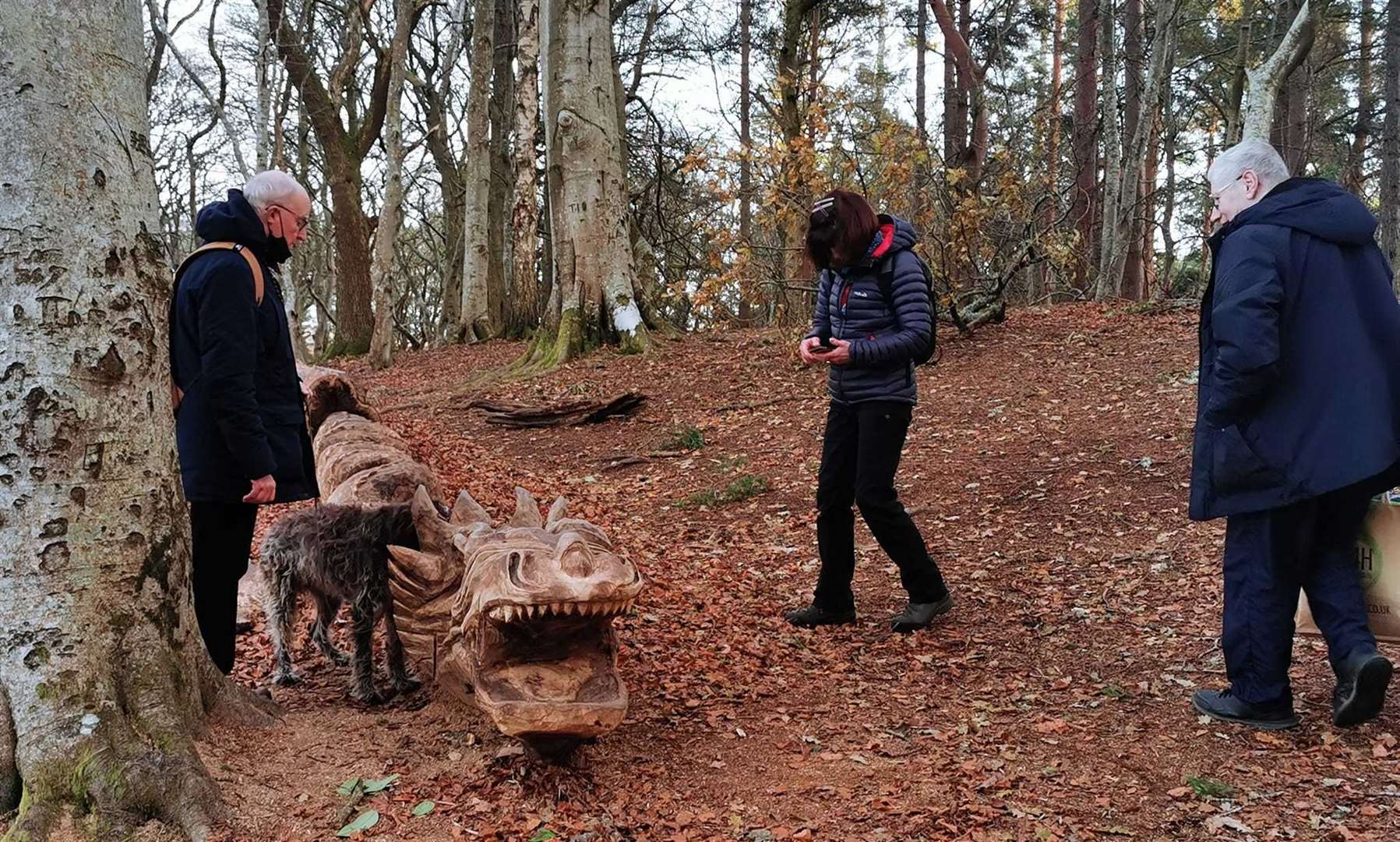 Checking out Smokey the dragon on a walk through Cluny Hill.