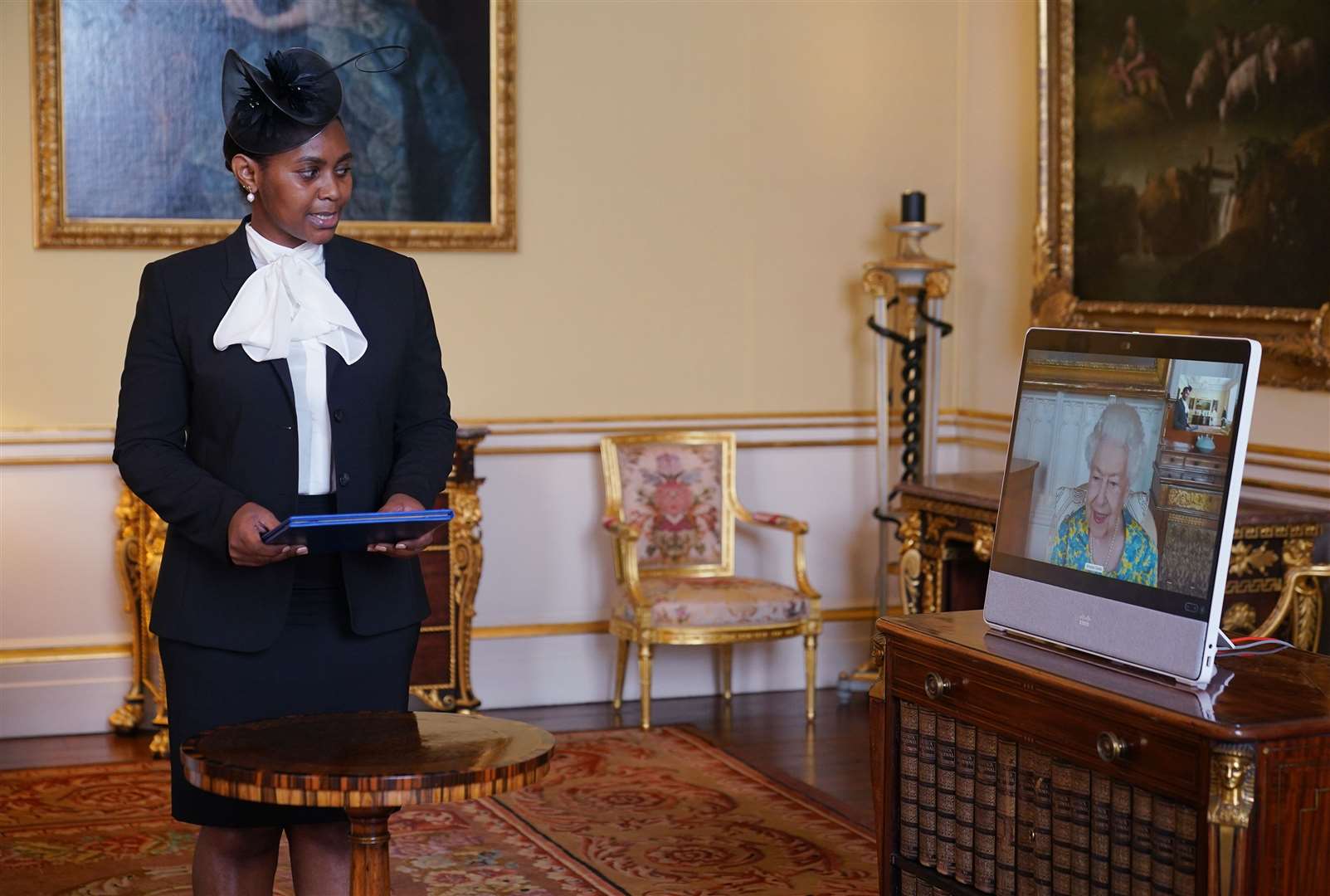 The Queen appears on a screen during a virtual audience with Thandazile Mbuyisa, High Commissioner for the Kingdom of Eswatini (Yui Mok/PA)