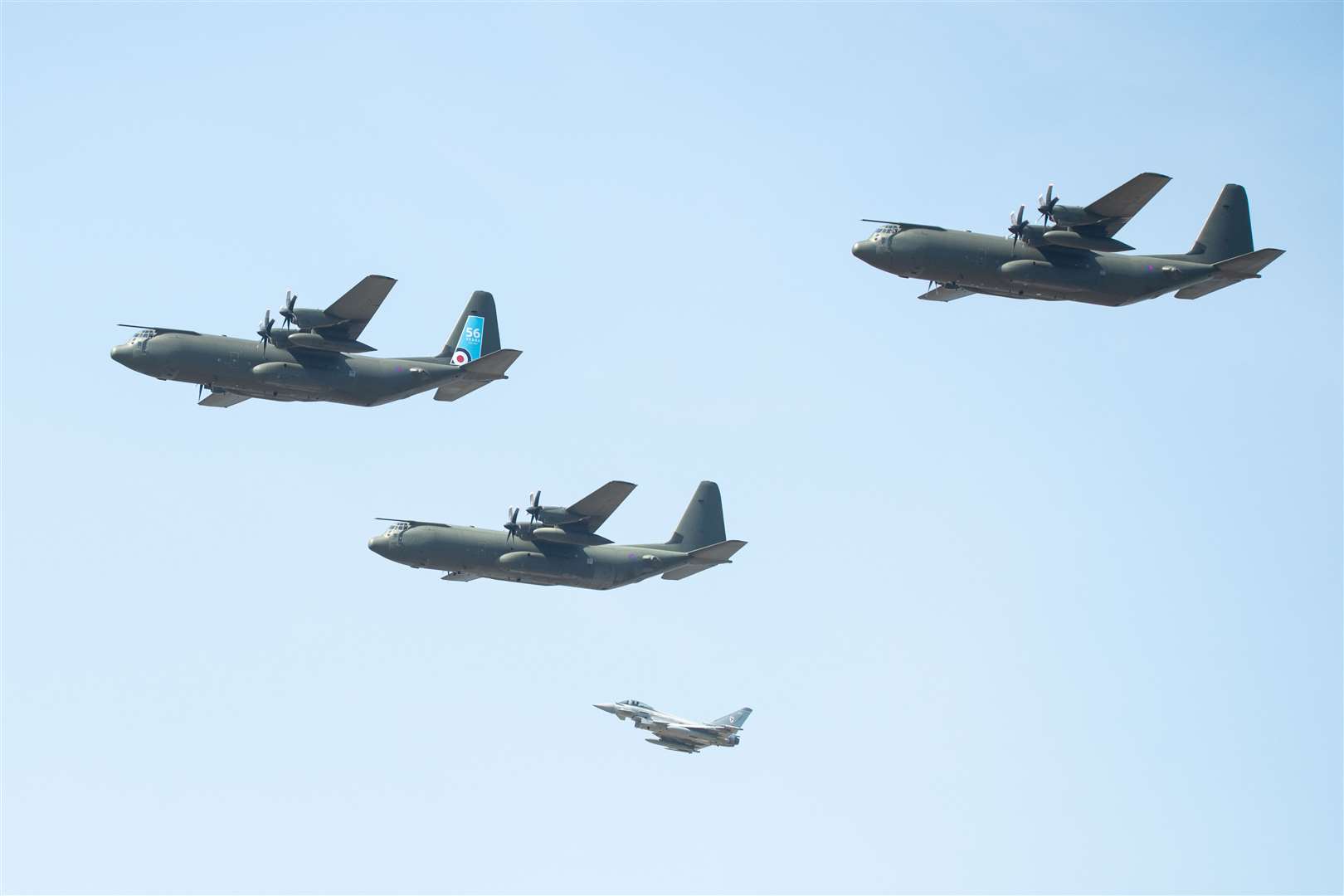 The imminent retirement of the Hercules from the RAF is marked by a flypast which went over RAF Lossiemouth. The three Hercules' were flanked by two Typhoons...Picture: Daniel Forsyth..