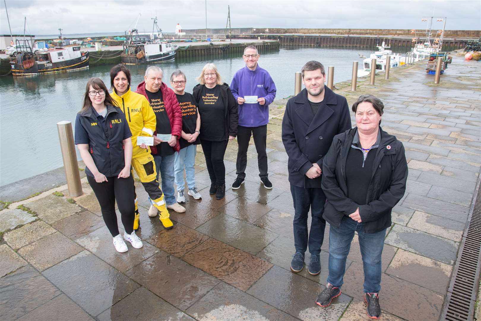 Moray Voluntary Befriending Service, Erskine Forres and Buckie RNLI are joined by Liz Davidson and Jamie Campbell from the jump. Picture: Daniel Forsyth.