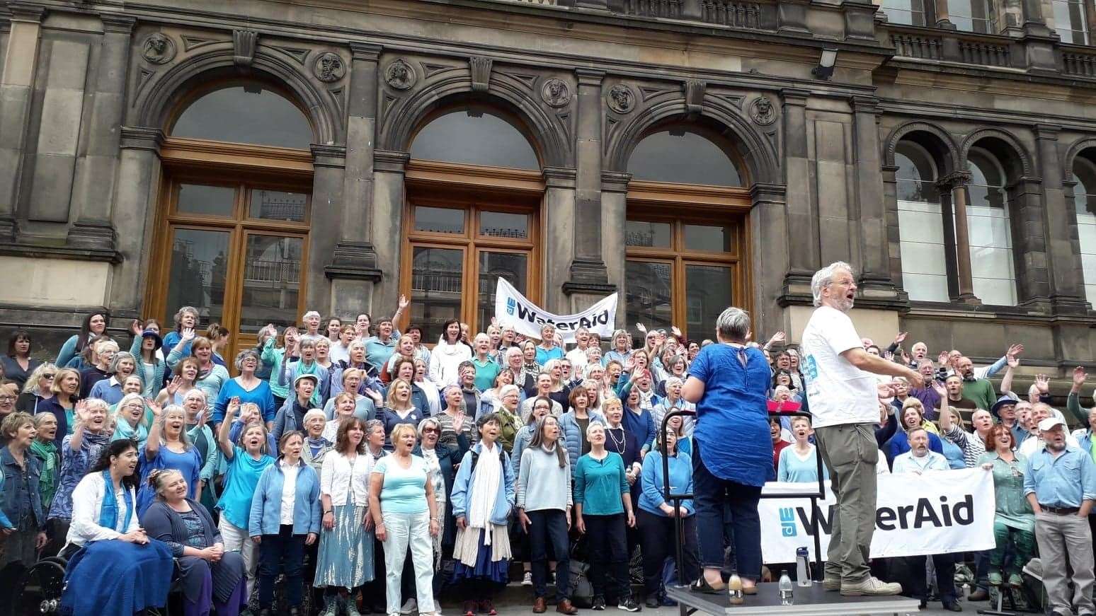 Members of the choir have visited Edinburgh on three times to support the Water Aid charity at a massed sing-song jointly conducted by Bill Henderson.