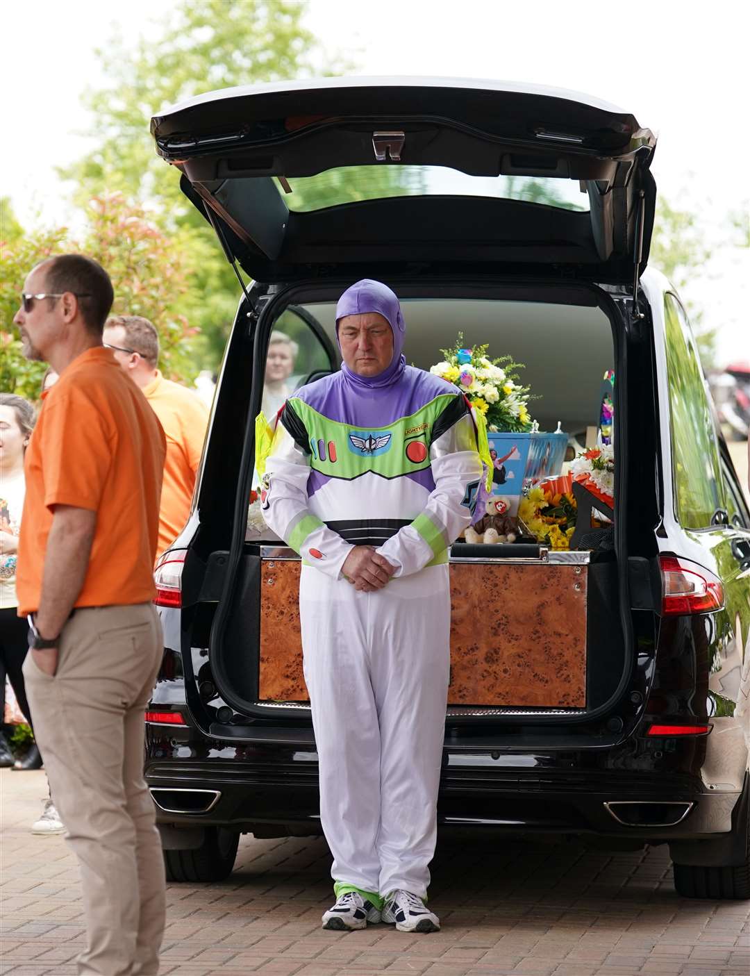 The funeral director in a Buzz Lightyear costume (Joe Giddens/PA)