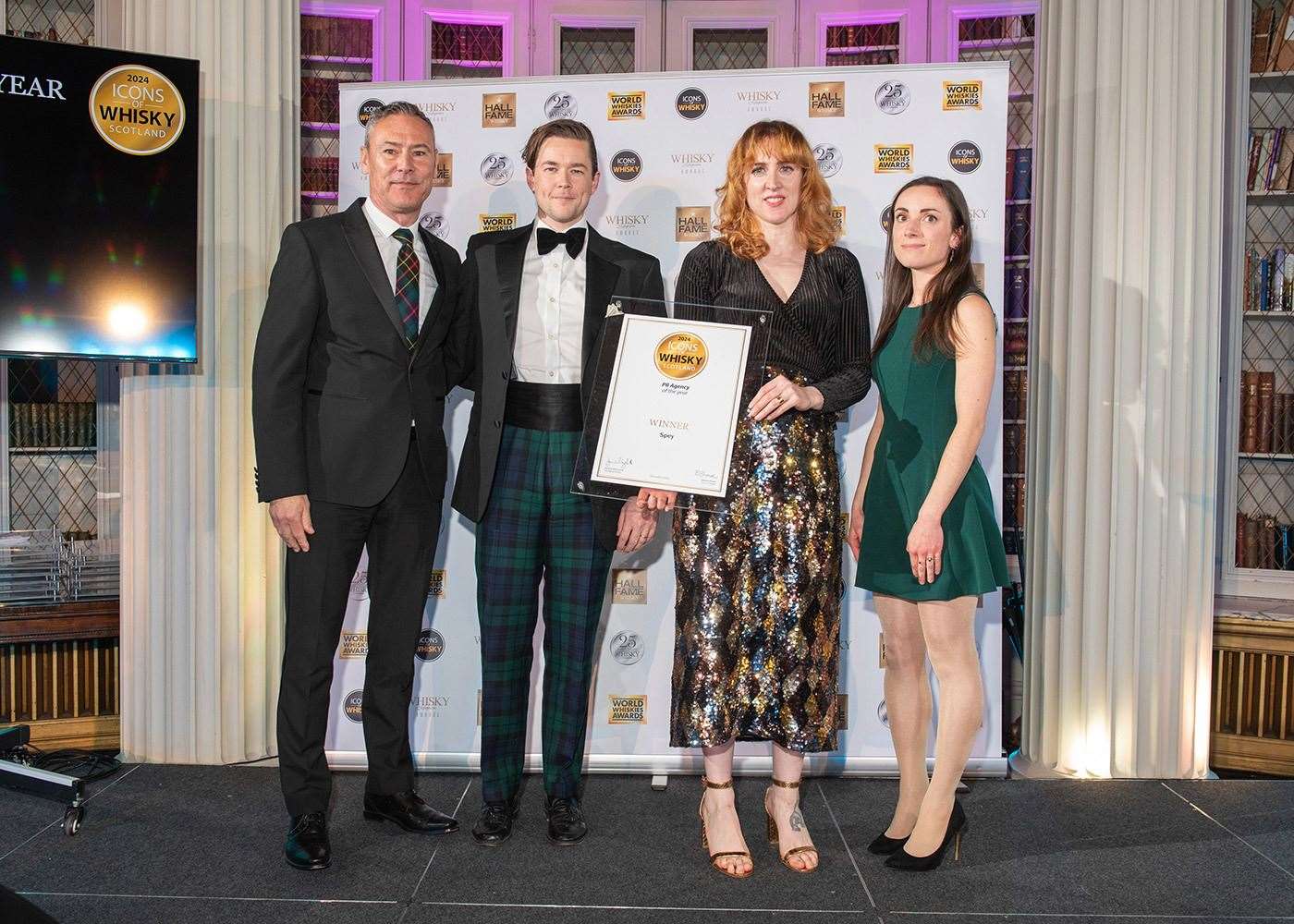 Spey PR's Jennifer Robertson (second from right) accepts Best PR Agency at the Icons of Whisky Awards.
