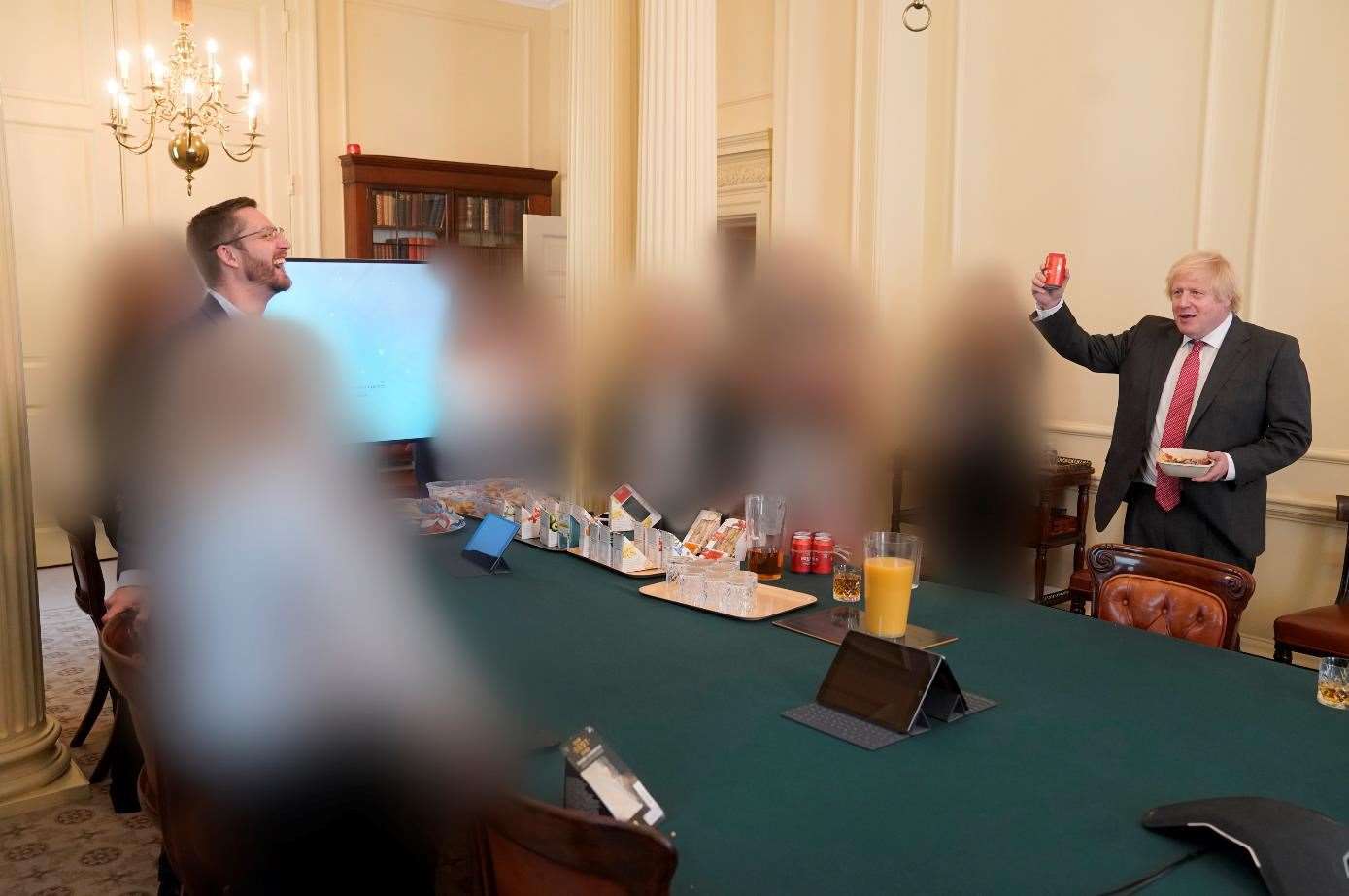 Boris Johnson, right, at a gathering in the Cabinet Room, as Lord Geidt said he had been only credibly clinging onto the role of ministerial interests adviser ‘by a very small margin’ over partygate (Sue Gray Report/Cabinet Office/PA)