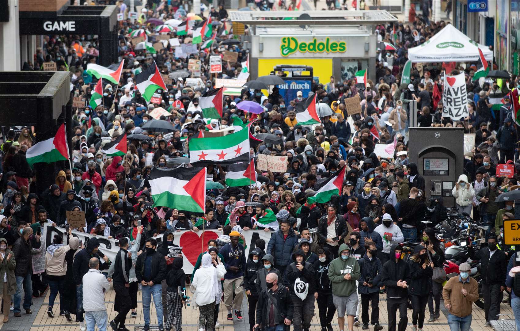 Demonstrators on Merchant Street in Bristol during a march in solidarity with the people of Palestine (Andrew Matthews/PA)