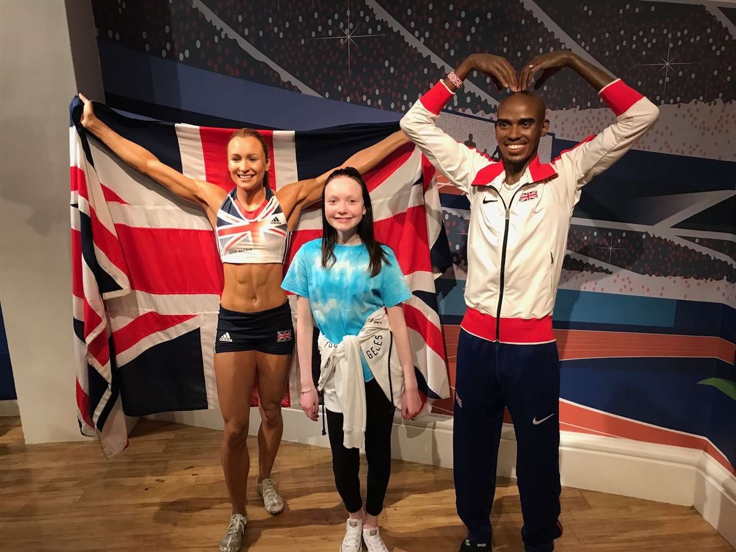 Abbie Main, pictured with GB sporting heroes at Madame Tussauds, has inspired a special charity effort in October.