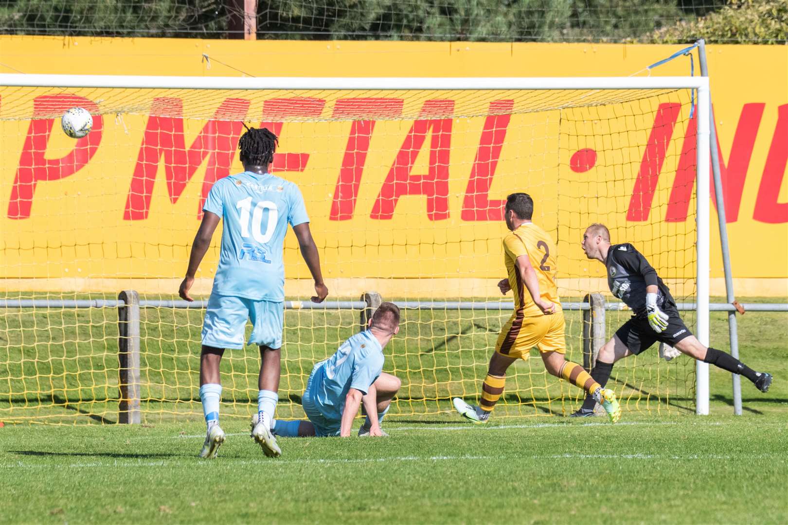 Keith forward Przemyslaw Nawrocki scores the second goal of the afternoon for the visitors. ..Forres Mechanics FC (1) vs Keith FC (2) - Highland Football League 22/23 - Mosset Park, Forres 27/08/2022...Picture: Daniel Forsyth..