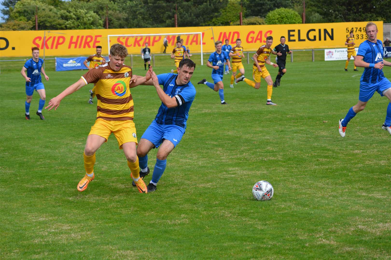 Ethan Cairns gets away from Strathspey Thistle captain James McShane. Picture: James Souter