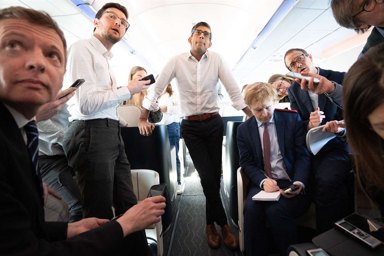 Prime Minister Rishi Sunak speaks to members of the travelling media during his flight to San Diego (Stefan Rousseau/PA)