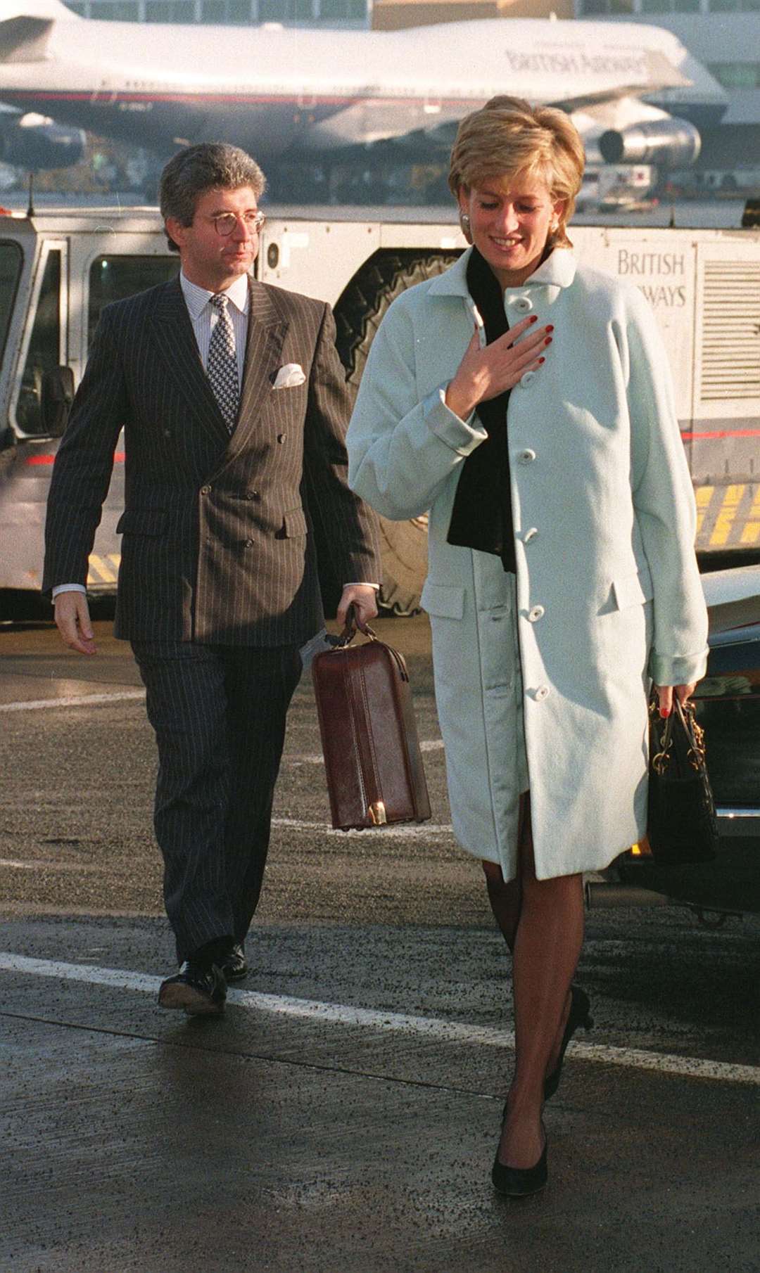 Diana with her then private secretary Patrick Jephson, at Heathrow Airport (Tim Ockenden/PA)