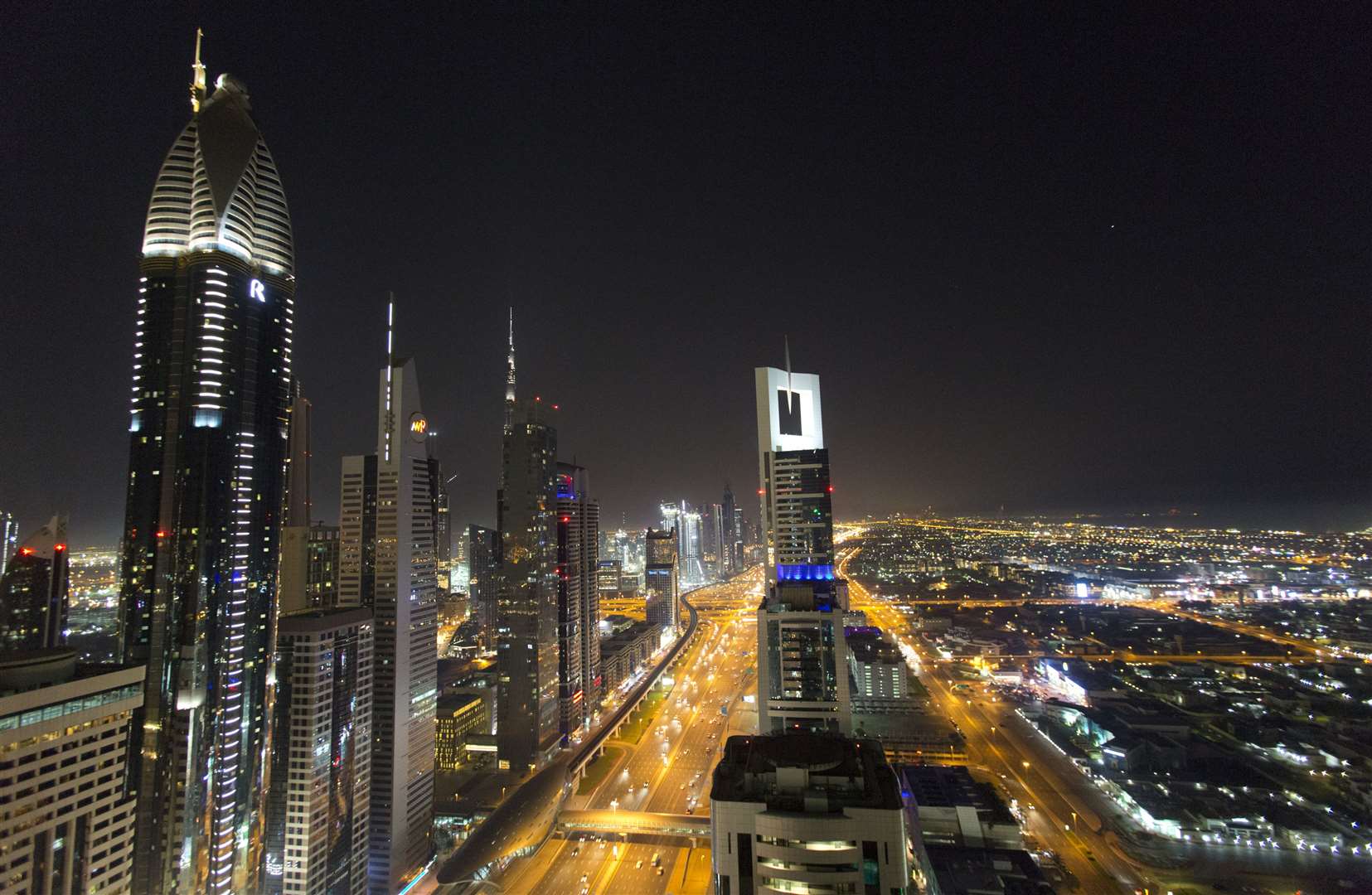 A view of the skyline at night of Dubai (Yui Mok/PA)