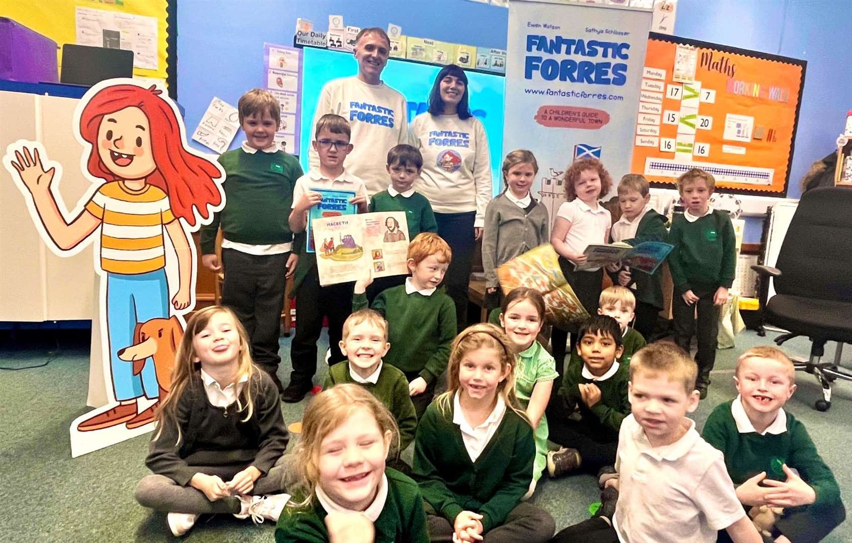 The author and illustrator with children at Applegrove Primary.