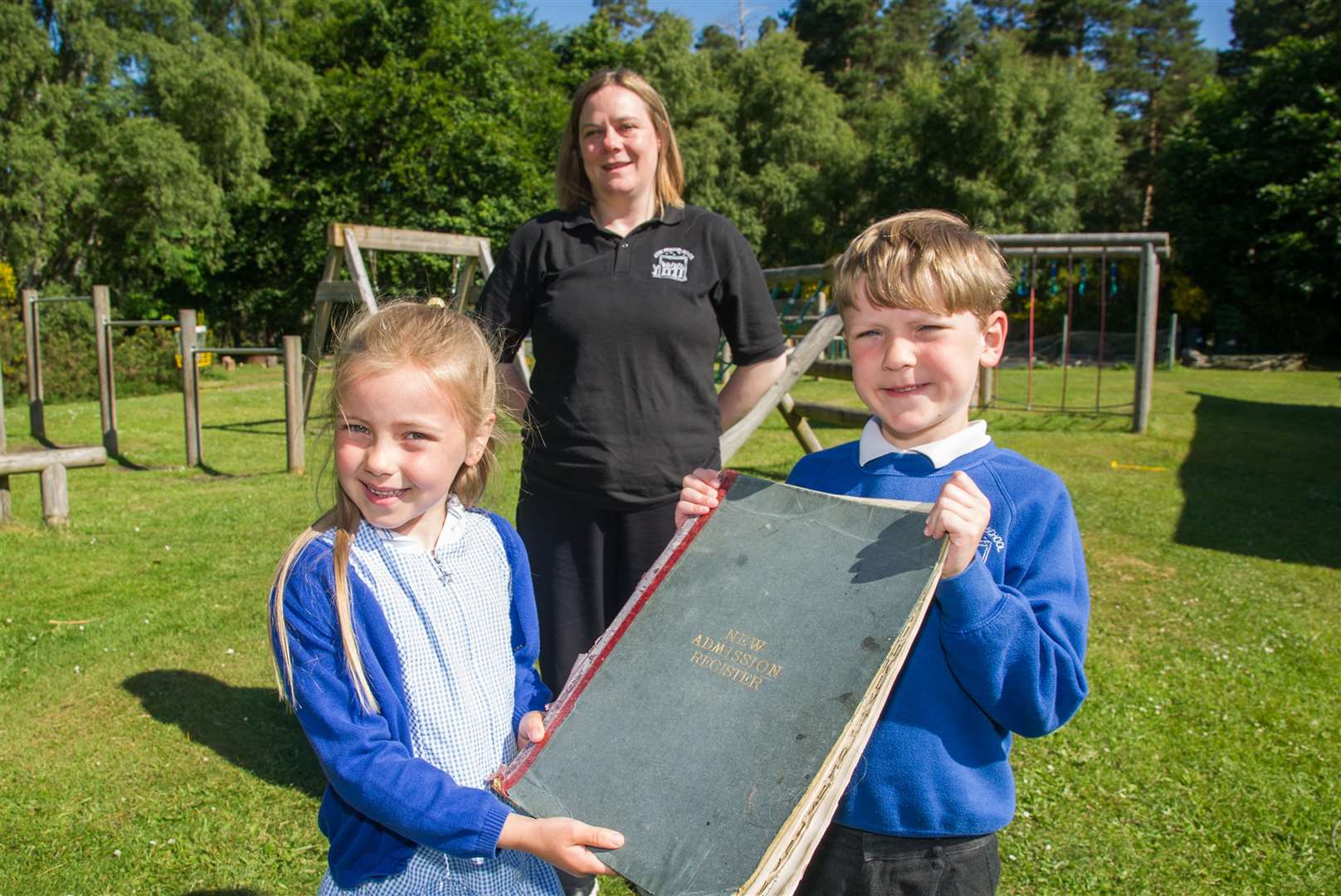 Chloe Nicolson (P2), Miss Elaine Grant and Joe Gardner (P1) have relatives on the Logie Primary School register that fell out of use in 1974.