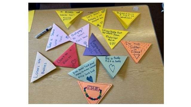 A variety of FAB-themed bunting showing positive messages created by pupils.
