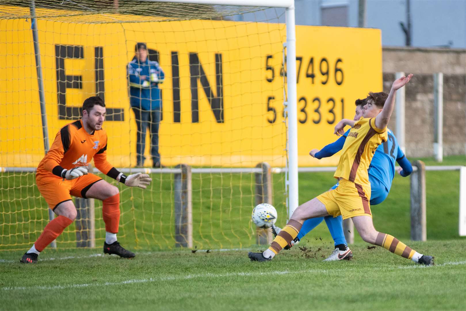 Forres forward Ben Barron opens the scoring for the home side as he beats Strathspey defender David Ross and keeper Michael MacCallum...Forres Mechanics FC (8) vs Strathspey Thistle FC (1) - Highland Football League 22/23 - Mosset Park, Forres 07/01/23...Picture: Daniel Forsyth..