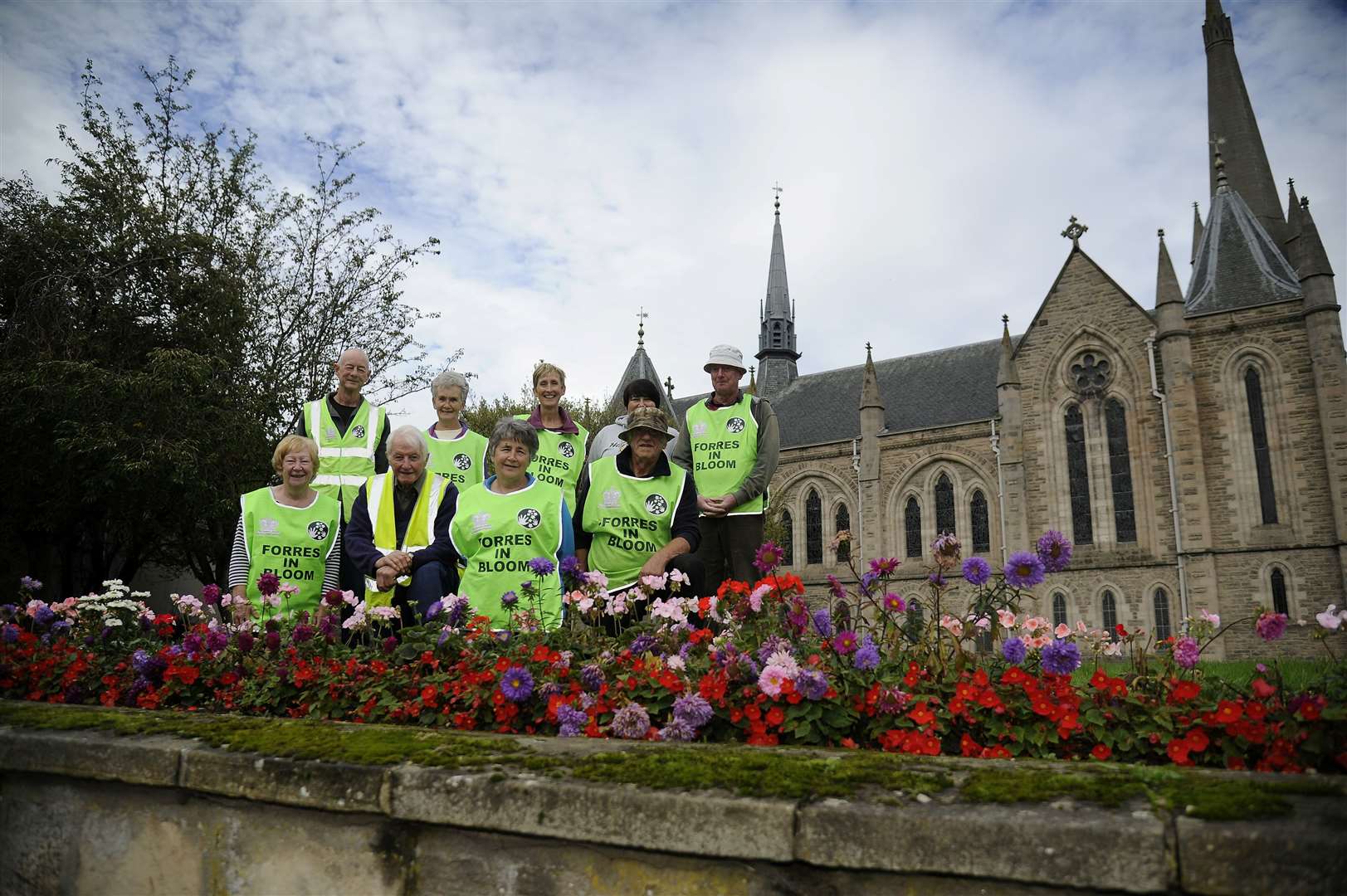 Forres In Bloom volunteers at their display outside St Laurence Church.