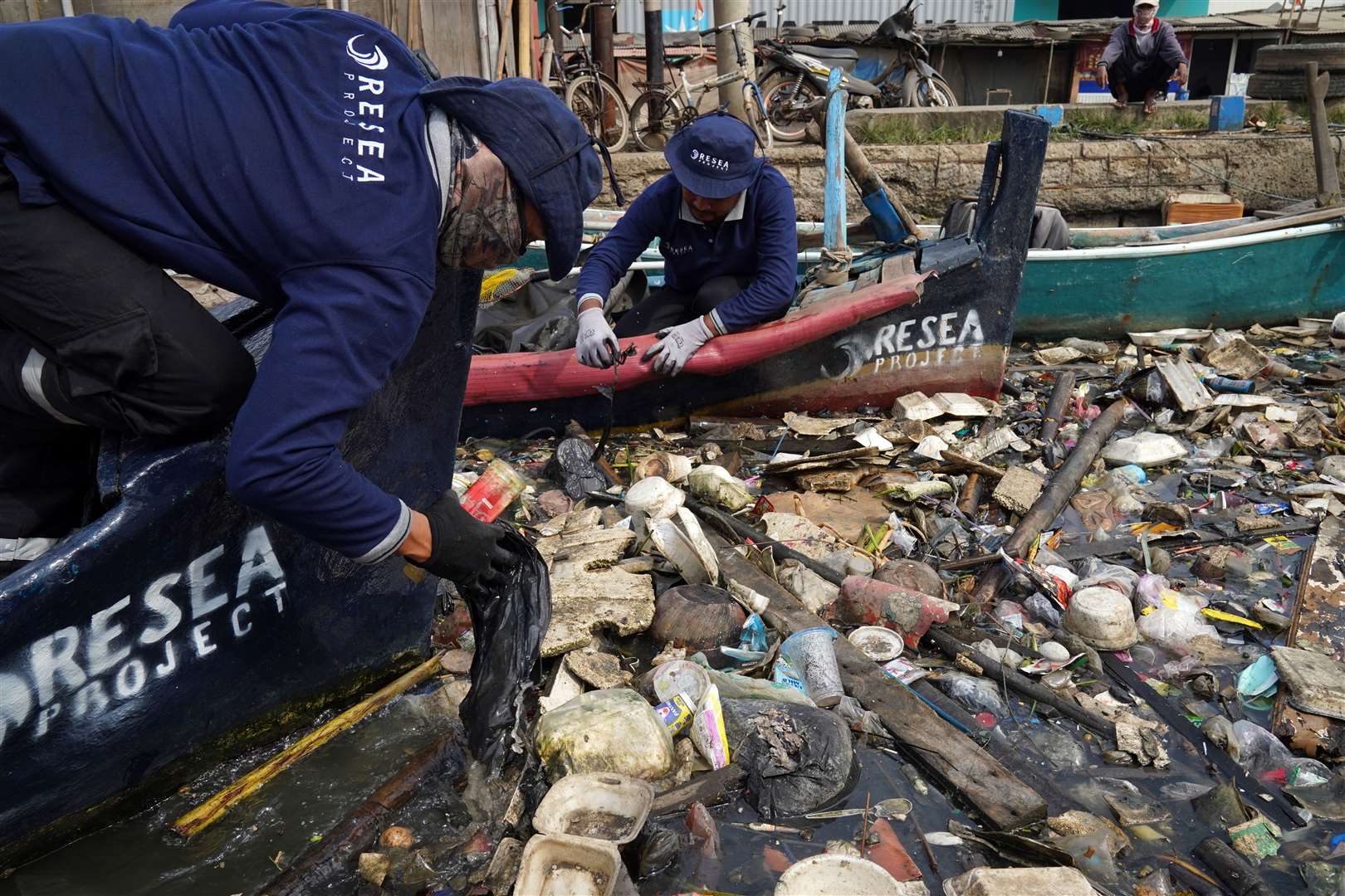 Workers from Danish firm, ReSea Project, collecting plastic waste in Indonesia (Owen Humphreys/PA)