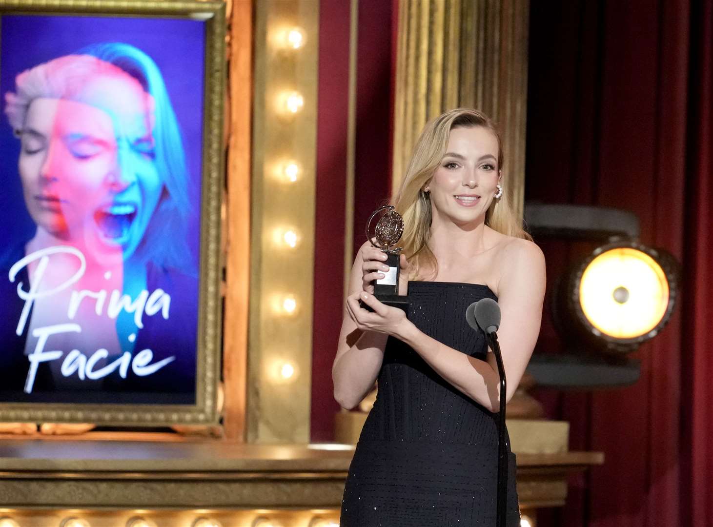 Jodie Comer accepts the award for best performance by an actress in a leading role in a play (Photo by Charles Sykes/Invision/AP)