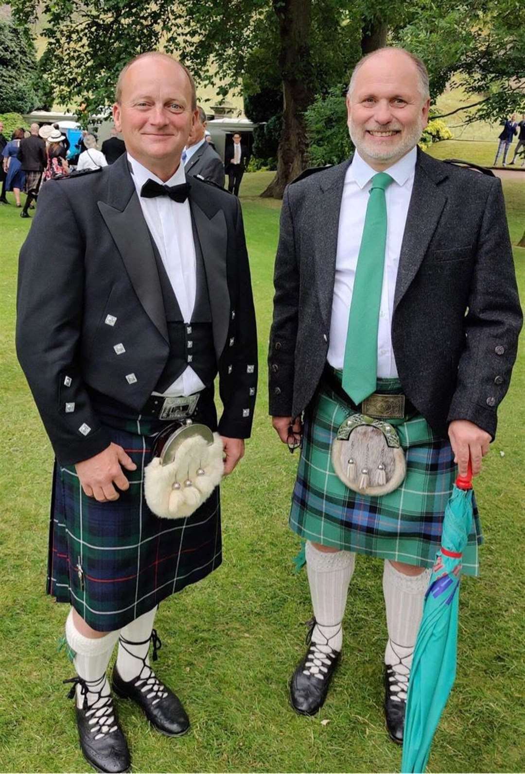 Simon Paterson (left) and Attie Macdonald at the garden party last month.