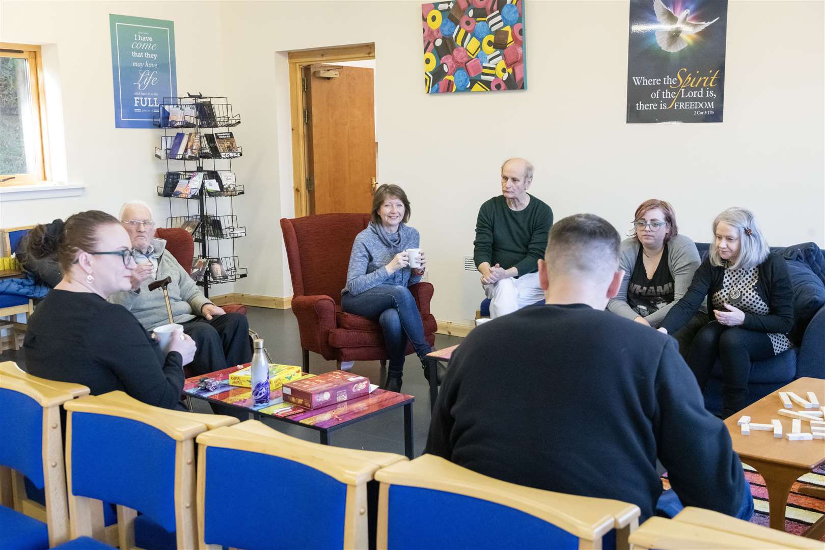 Members of the public inside the warm space being offered by Forres Baptist Church on Tuesdays from 10-12am that includes games and food and drink...Picture: Beth Taylor.
