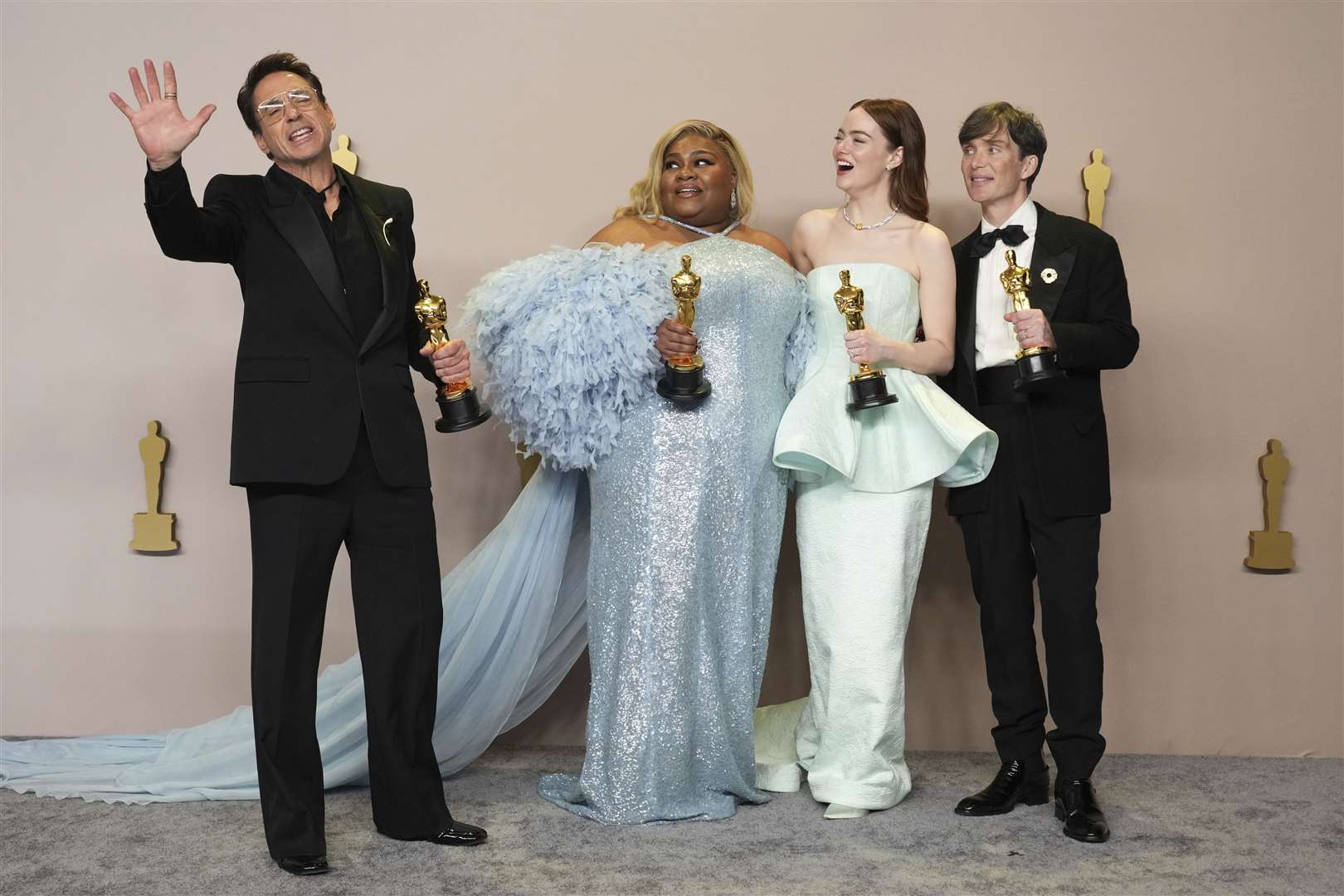 (L to R) Robert Downey Jr, best supporting actor, Oppenheimer; Da’Vine Joy Randolph, best supporting actress, The Holdovers; Emma Stone, best actress, Poor Things; and Cillian Murphy, best actor, Oppenheimer (Jordan Strauss/Invision/AP)