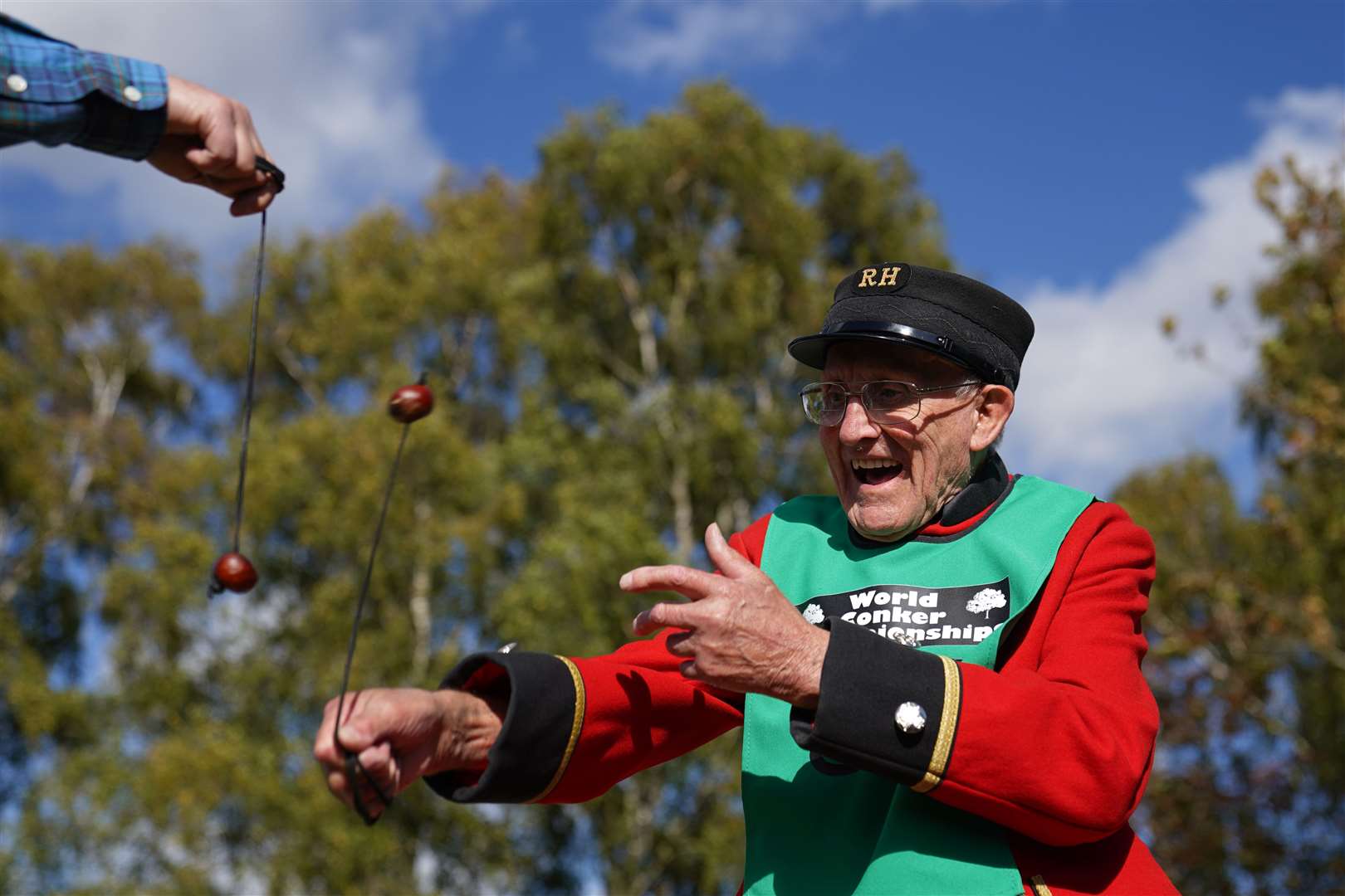 Chelsea pensioner John Riley, 92, used his years of experience during the annual World Conker Championships at the Shuckburgh Arms in Southwick, Peterborough (Joe Giddens/PA)